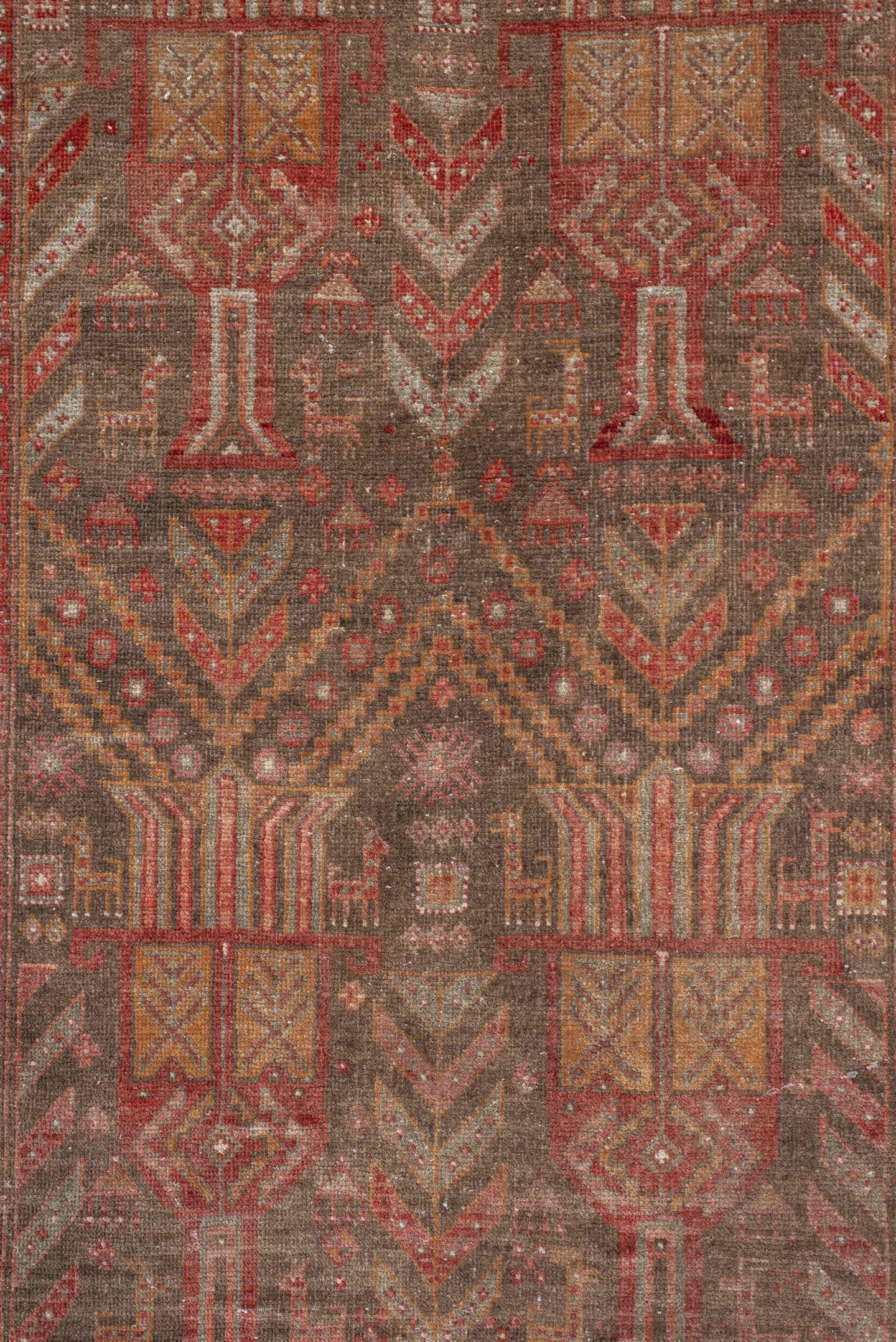 3' x 9' one-of-a-kind handmade antique Belouch runner rug. Color palette: taupe, rust, ivory, brown, terra cotta, camel