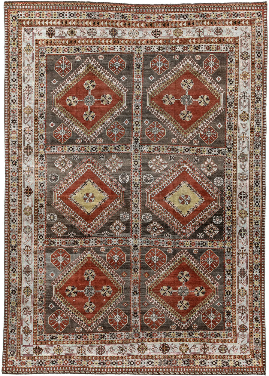 6' x 9' one-of-a-kind handmade antique Shiraz medium size rug. Color palette: ivory, rust, brown, taupe, gold, charcoal
