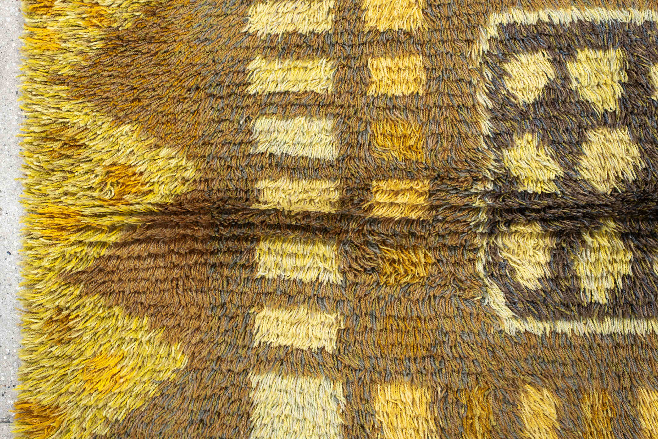 4' x 5' one-of-a-kind handmade vintage Rya-Swedish small size rug. Color palette: gold, brown, ochre, ivory, camel, olive