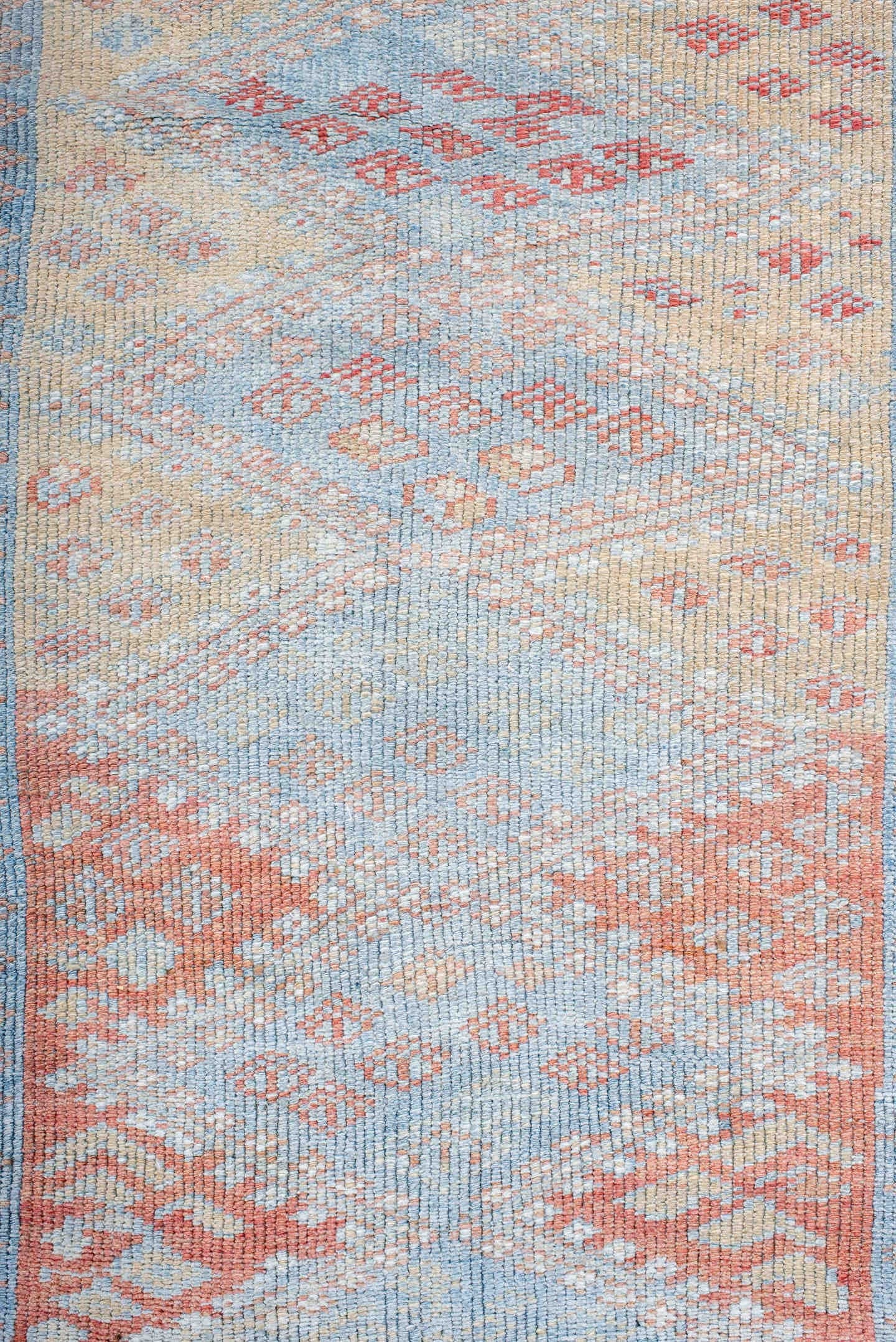 3' x 9' one-of-a-kind handmade antique Kurd runner rug. Color palette: ivory, sky blue, coral, rust, pale blue, salmon