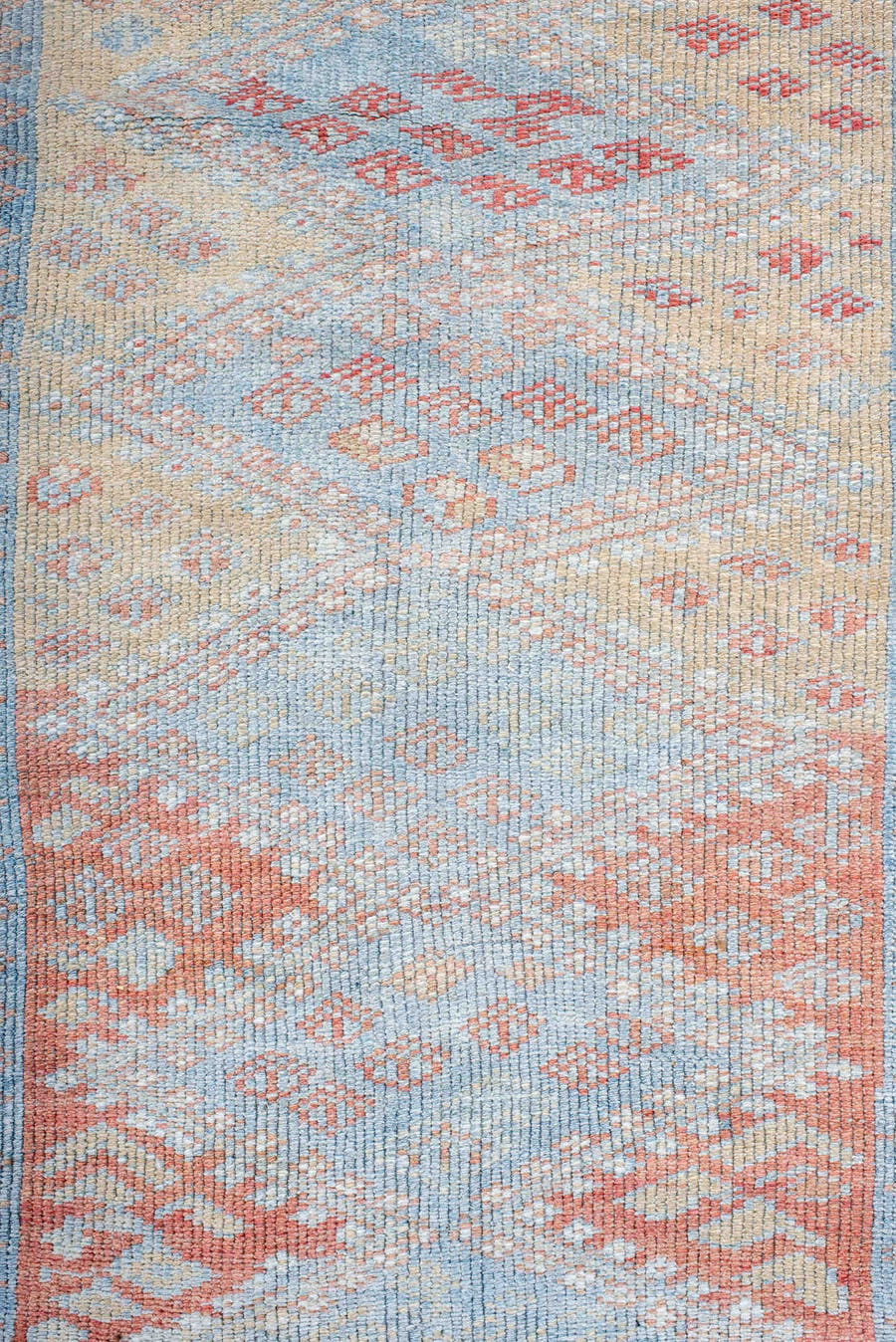 3' x 9' one-of-a-kind handmade antique Kurd runner rug. Color palette: ivory, sky blue, coral, rust, pale blue, salmon