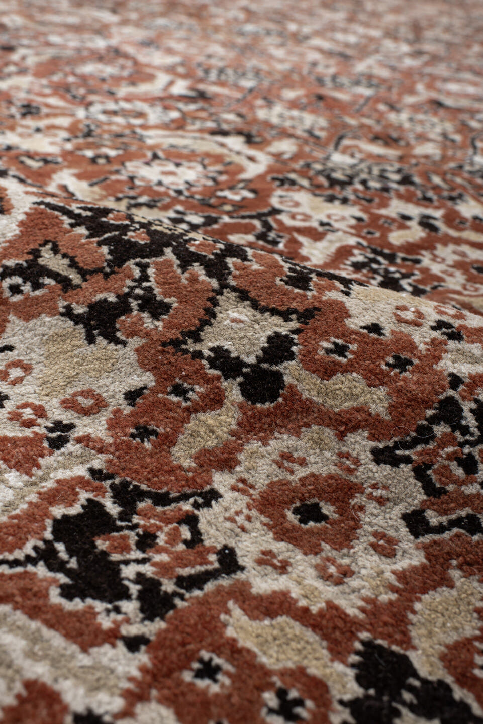 12' x 15' one-of-a-kind handmade antique Agra oversize rug. Color palette: terra cotta, ivory, charcoal, taupe, brown, camel