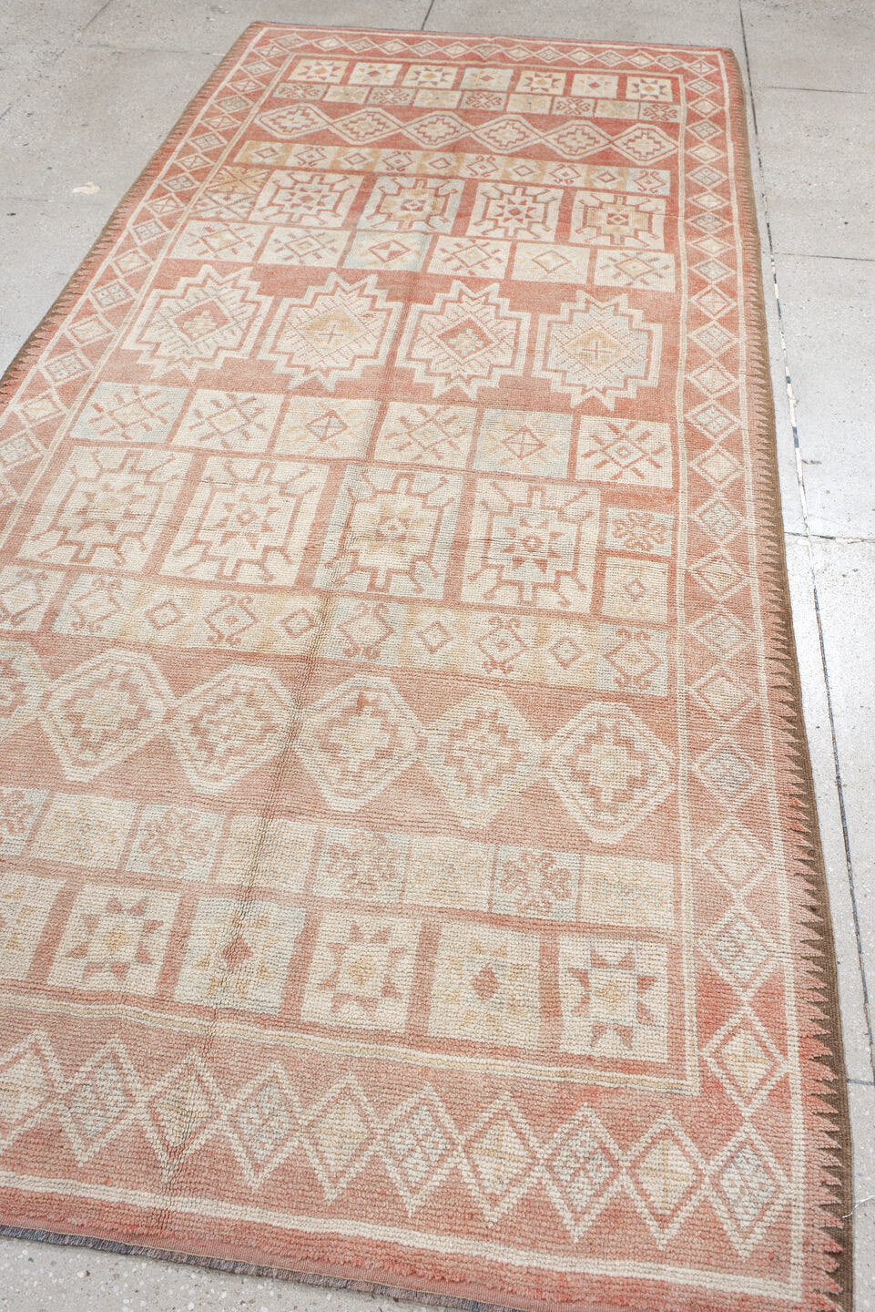 4' x 11' one-of-a-kind handmade antique Moroccan runner rug. Color palette: ivory, salmon, blush, peach, pink, terracotta