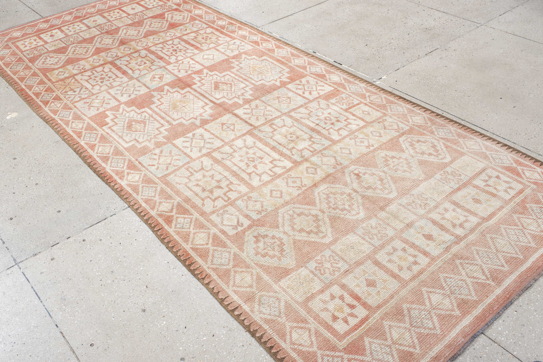 4' x 11' one-of-a-kind handmade antique Moroccan runner rug. Color palette: ivory, salmon, blush, peach, pink, terracotta