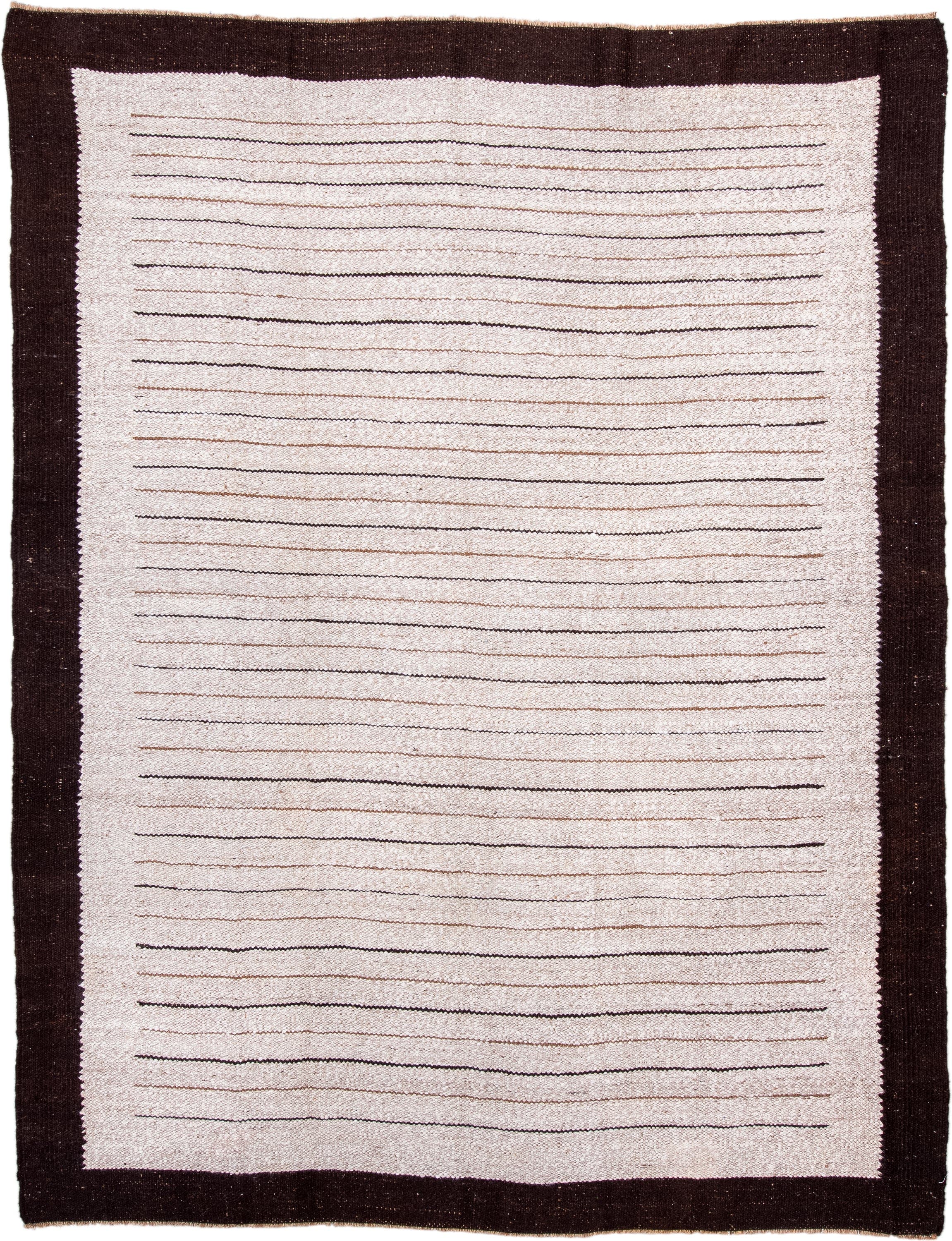 8' x 10' one-of-a-kind handmade antique Kilim large size rug. Color palette: ivory, espresso, taupe, brown, black, beige