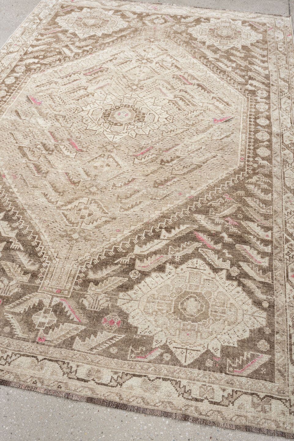 4' x 7' one-of-a-kind handmade antique Shiraz rug. Color palette: ivory, taupe, beige, rose, camel, gray, pink, red