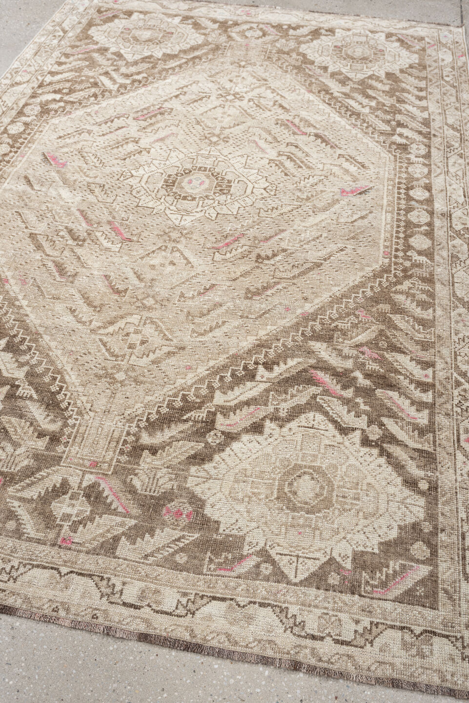 4' x 7' one-of-a-kind handmade antique Shiraz rug. Color palette: ivory, taupe, beige, rose, camel, gray, pink, red