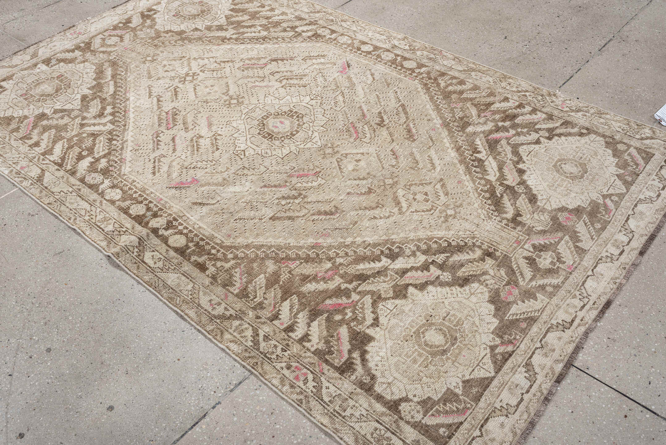 4' x 7' one-of-a-kind handmade antique Shiraz rug. Color palette: ivory, taupe, beige, rose, camel, gray, pink, red