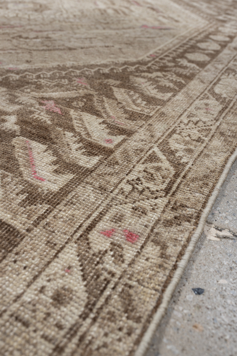 4' x 7' one-of-a-kind handmade antique Shiraz rug. Color palette: ivory, taupe, beige, rose, camel, gray, pink, red