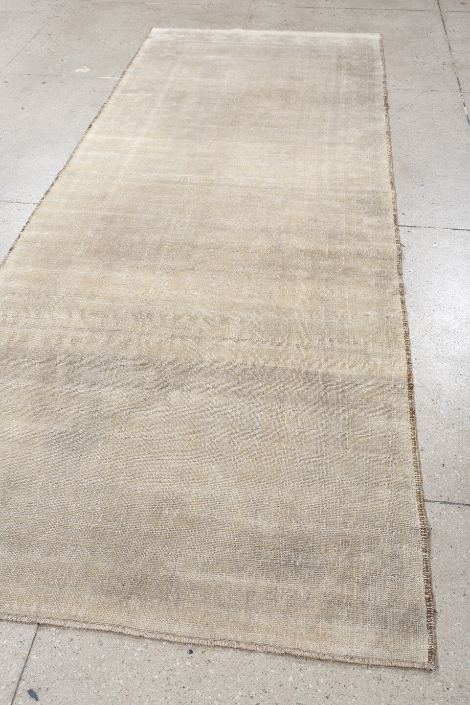 9' x 3' one-of-a-kind handmade antique Belouch rug. Color palette: ivory, taupe, cream, beige, camel, light gray, gray