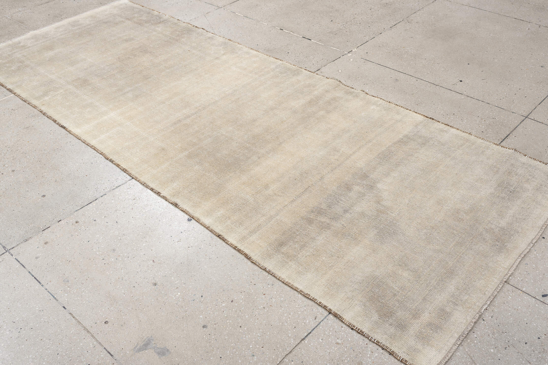 9' x 3' one-of-a-kind handmade antique Belouch rug. Color palette: ivory, taupe, cream, beige, camel, light gray, gray