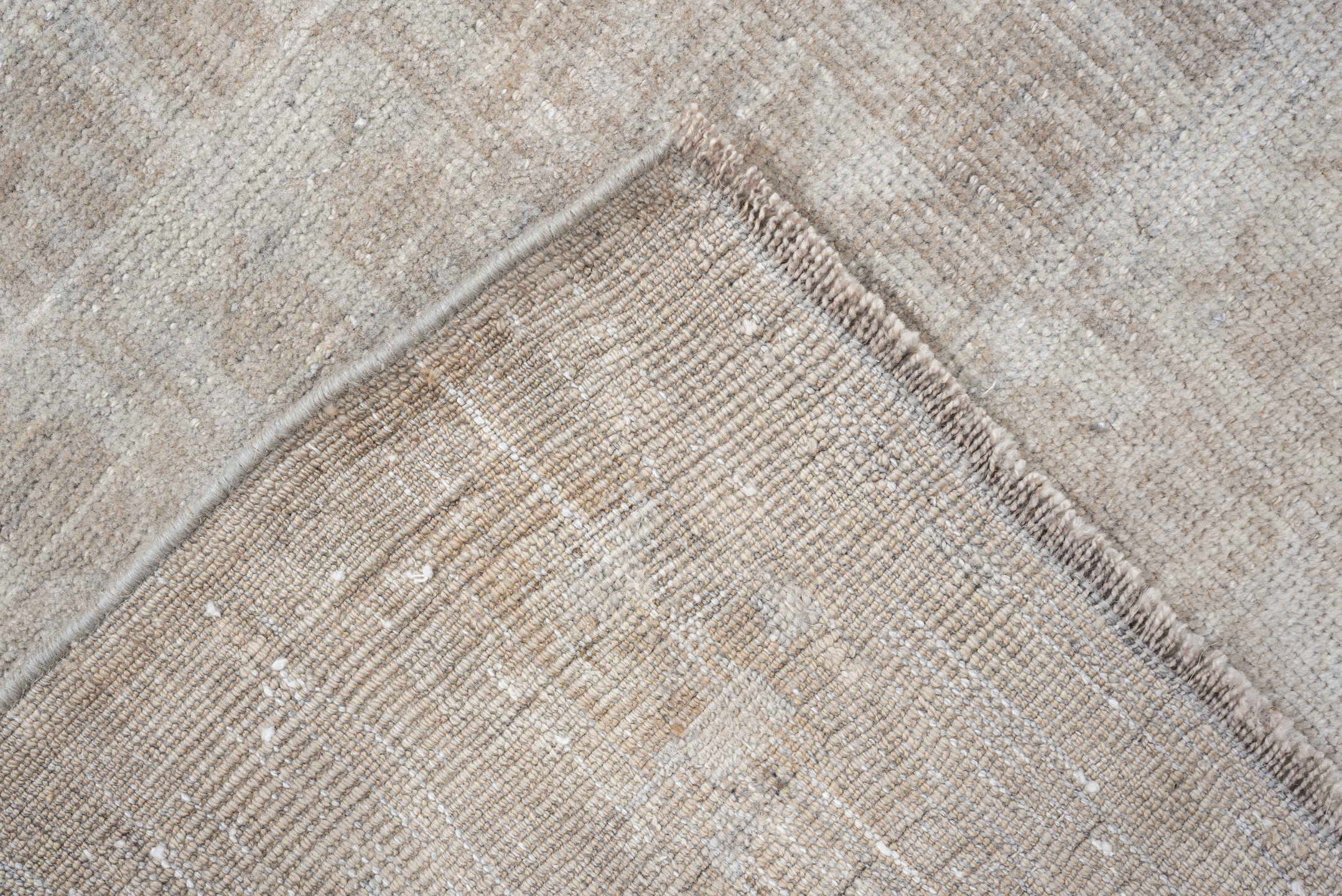 3' x 6' one-of-a-kind handmade antique Belouch small size rug. Color palette: ivory, taupe, silver gray, cream, beige
