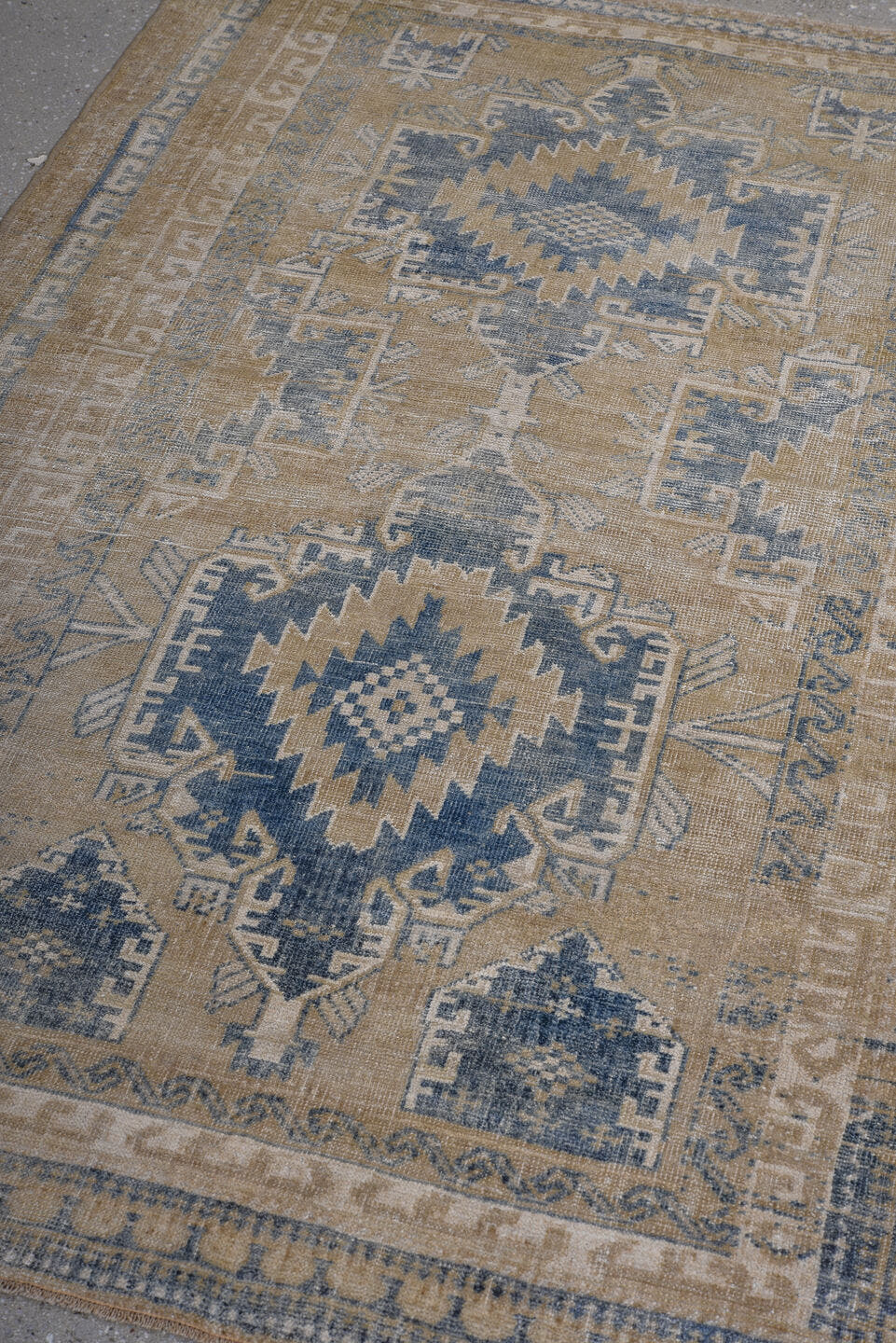 3' x 4' one-of-a-kind handmade antique Caucasian small size rug. Color palette: camel, faded blue, ivory, beige, taupe, blue