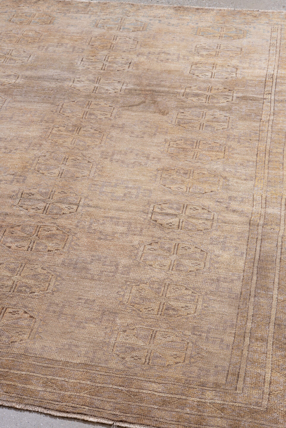 5' x 6' one-of-a-kind handmade antique Bokara rug. Color palette: camel, taupe, beige, ivory, sand, light brown, gray, brown
