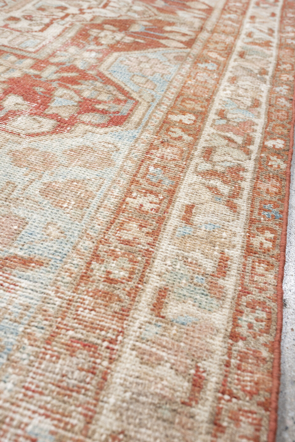 4' x 6' one-of-a-kind handmade antique Baktiary rug. Color palette: ivory, terracotta, pale blue, beige, taupe, camel, brown