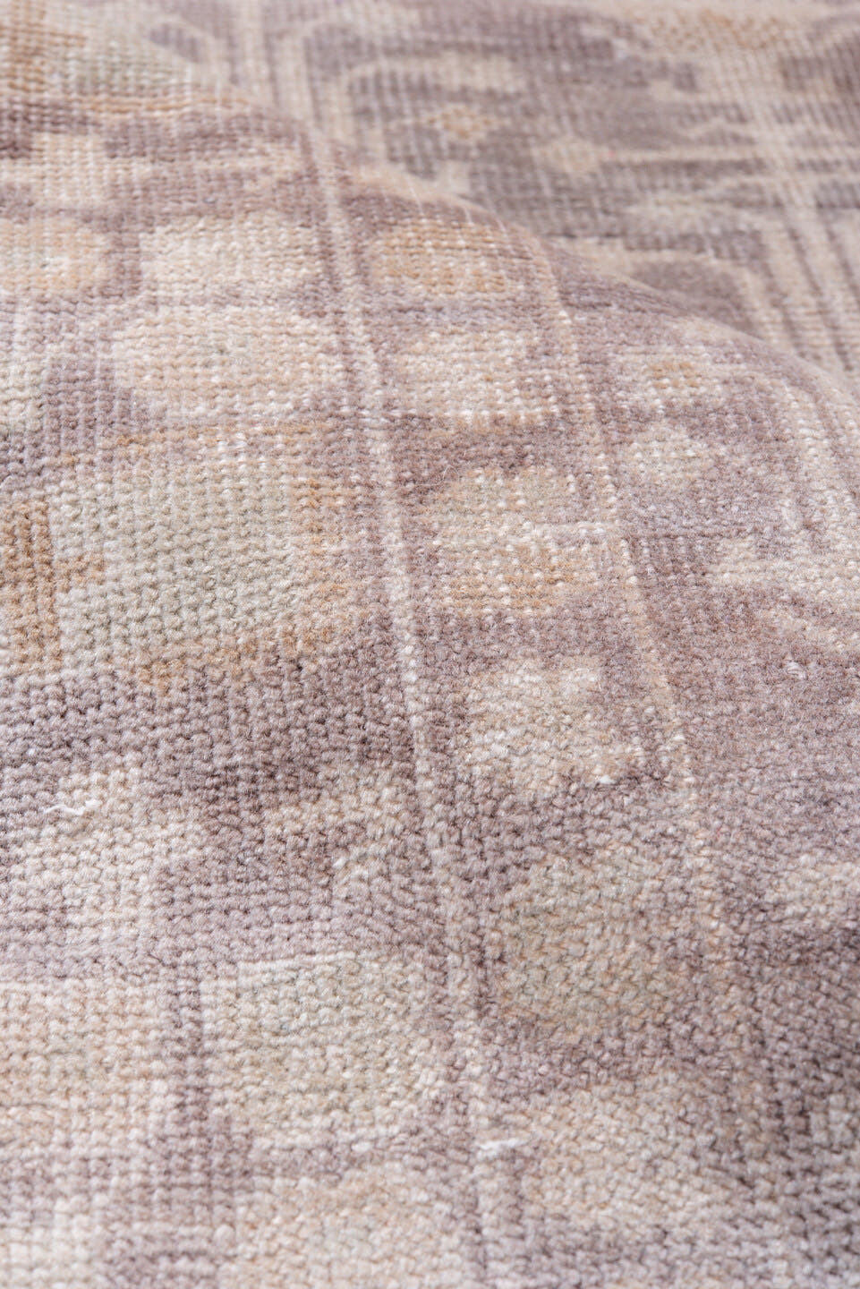 2' x 9' one-of-a-kind handmade antique Belouch runner rug. Color palette: taupe, ivory, dusty rose, beige, camel
