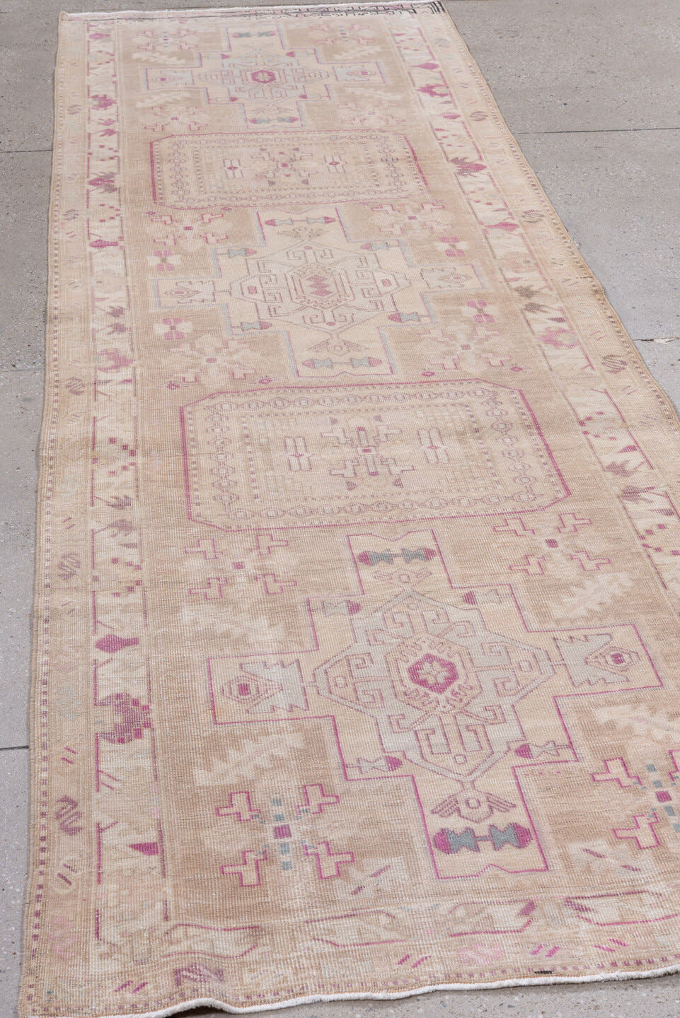 3' x 10' one-of-a-kind handmade antique  runner rug. Color palette: ivory, blush, rose, taupe, lavender, pink, red, beige