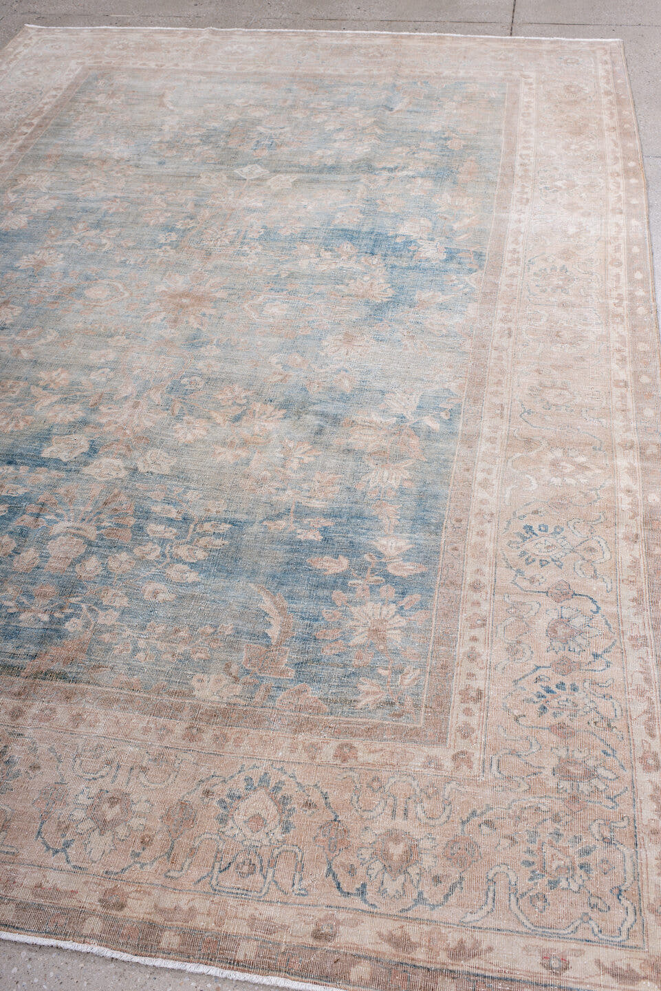 7' x 10' one-of-a-kind handmade antique Tabriz large size rug. Color palette: ivory, powder blue, blush, taupe, pale rose