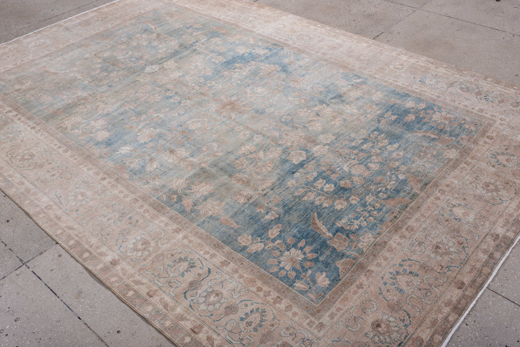 7' x 10' one-of-a-kind handmade antique Tabriz large size rug. Color palette: ivory, powder blue, blush, taupe, pale rose