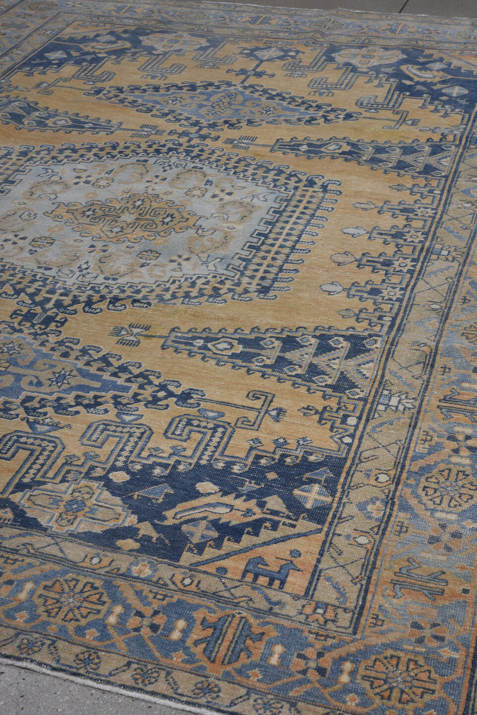 7' x 10' one-of-a-kind handmade antique Veece large size rug. Color palette: camel, powder blue, indigo, ivory, taupe, slate