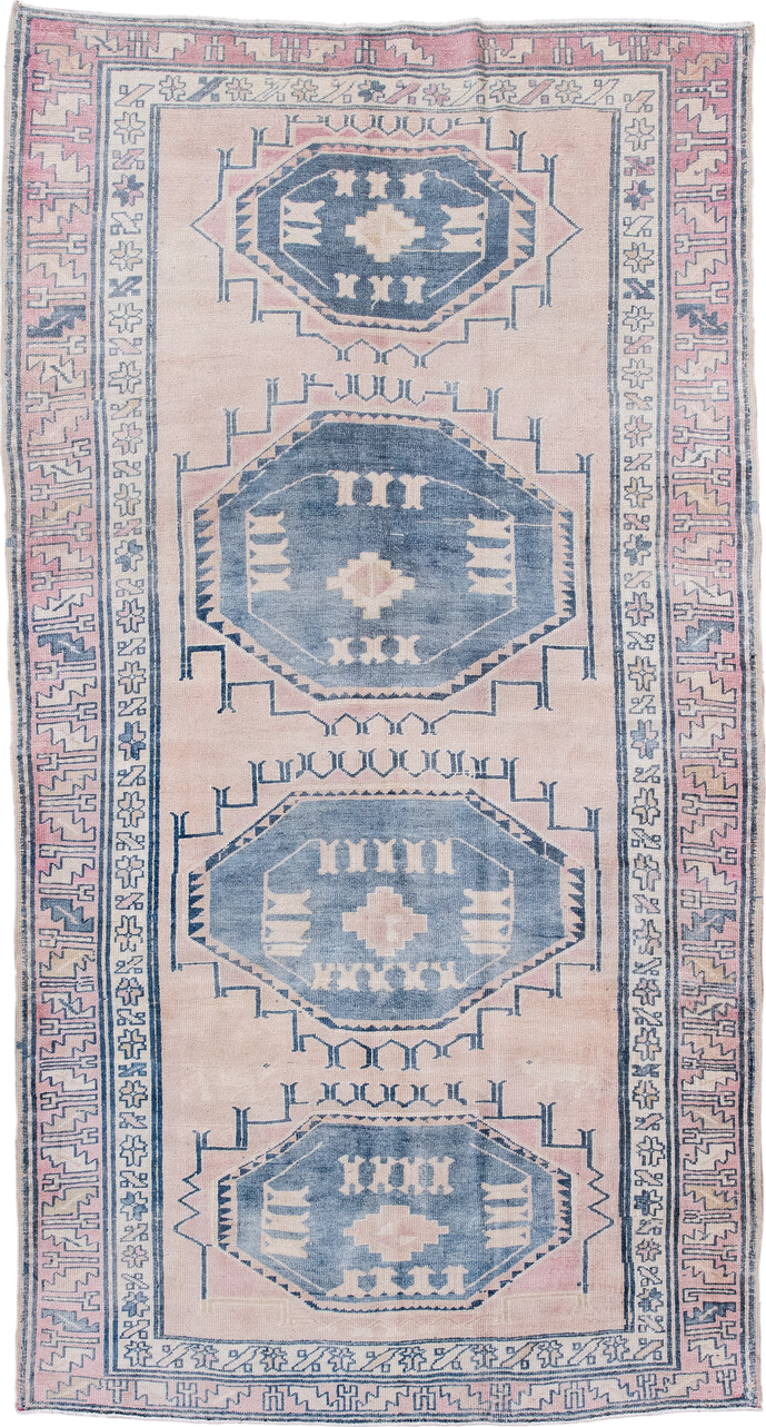 5' x 9' one-of-a-kind handmade antique Caucasian medium size rug. Color palette: blush, blue, ivory, navy, rose, cream, pink