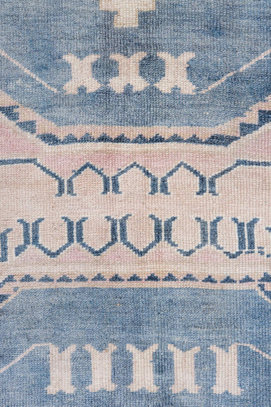 5' x 9' one-of-a-kind handmade antique Caucasian medium size rug. Color palette: blush, blue, ivory, navy, rose, cream, pink