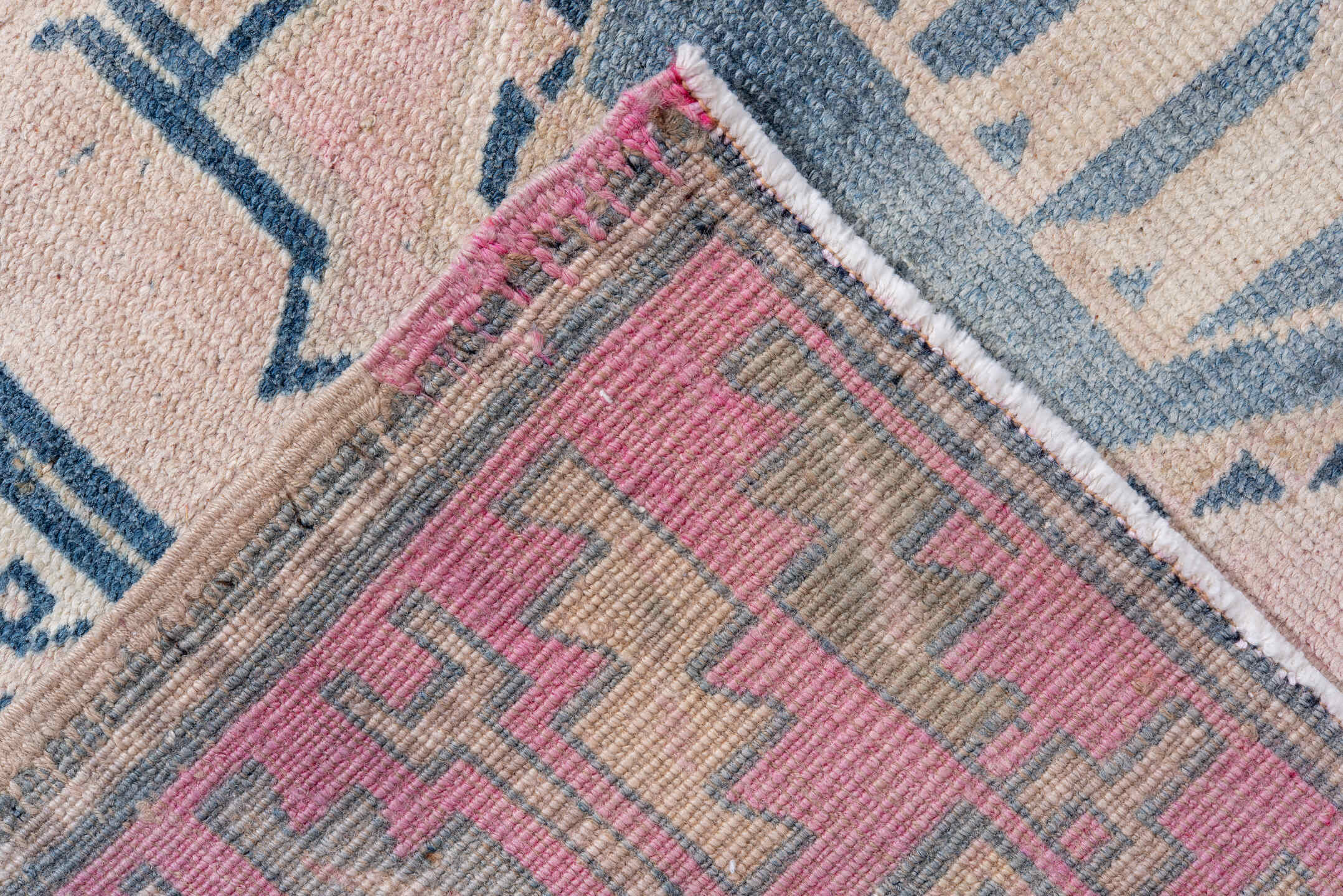 5' x 9' one-of-a-kind handmade antique Caucasian medium size rug. Color palette: blush, blue, ivory, navy, rose, cream, pink