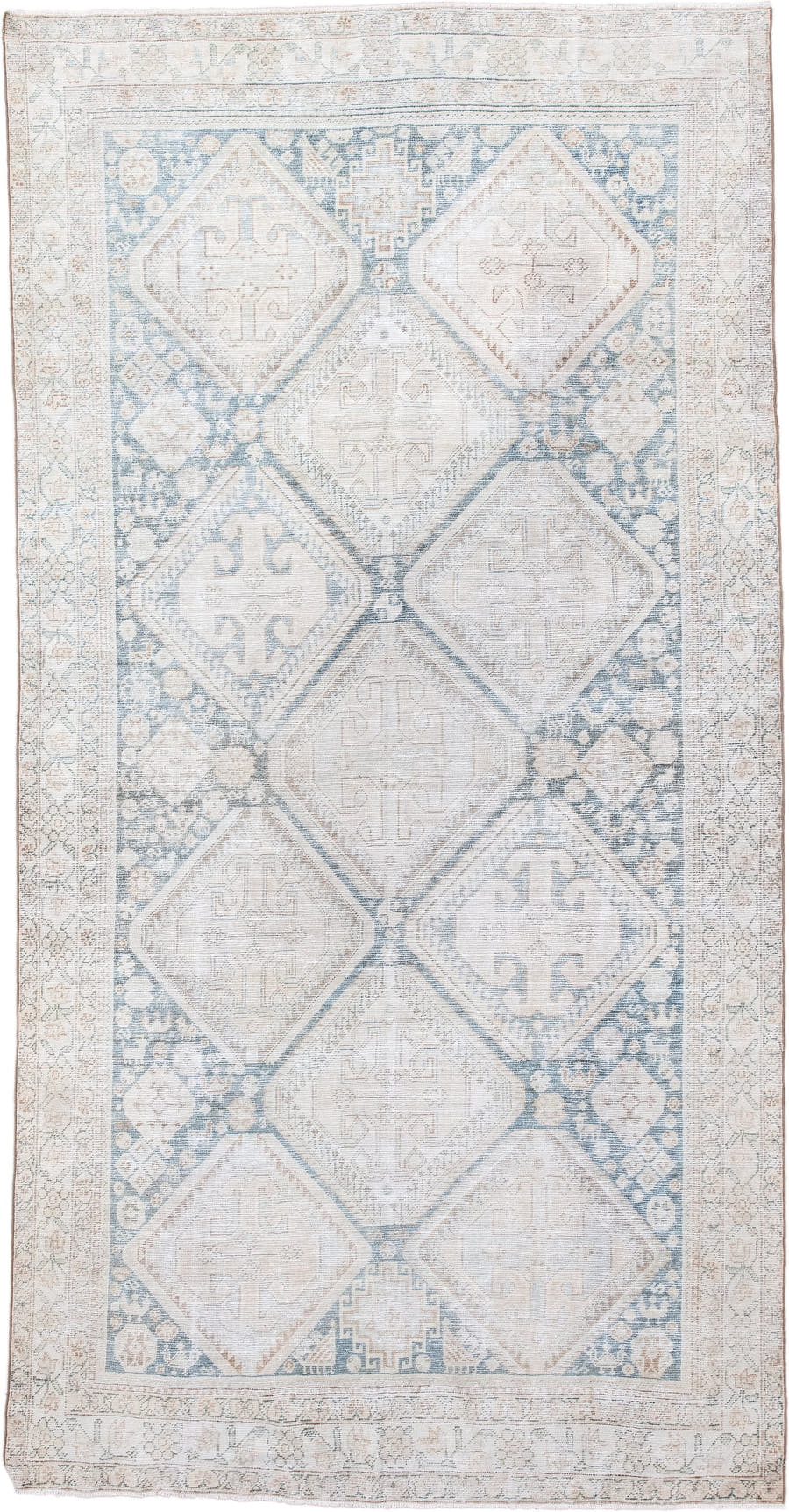 5' x 9' one-of-a-kind handmade antique Farahan medium size rug. Color palette: ivory, pale blue, sand, beige, taupe