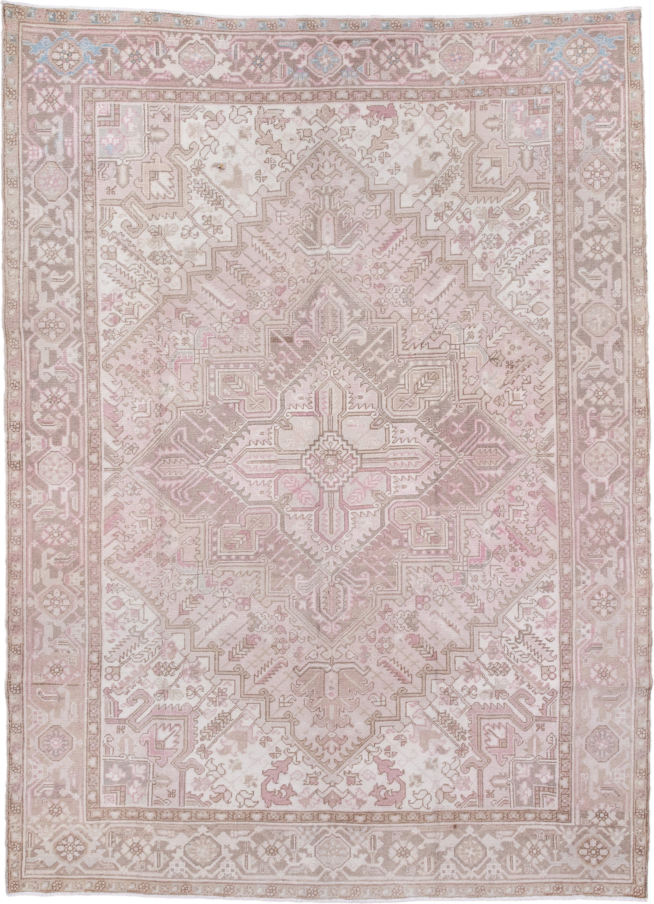 6' x 9' one-of-a-kind handmade antique Heriz medium size rug. Color palette: ivory, blush, taupe, pale blue, dusty rose