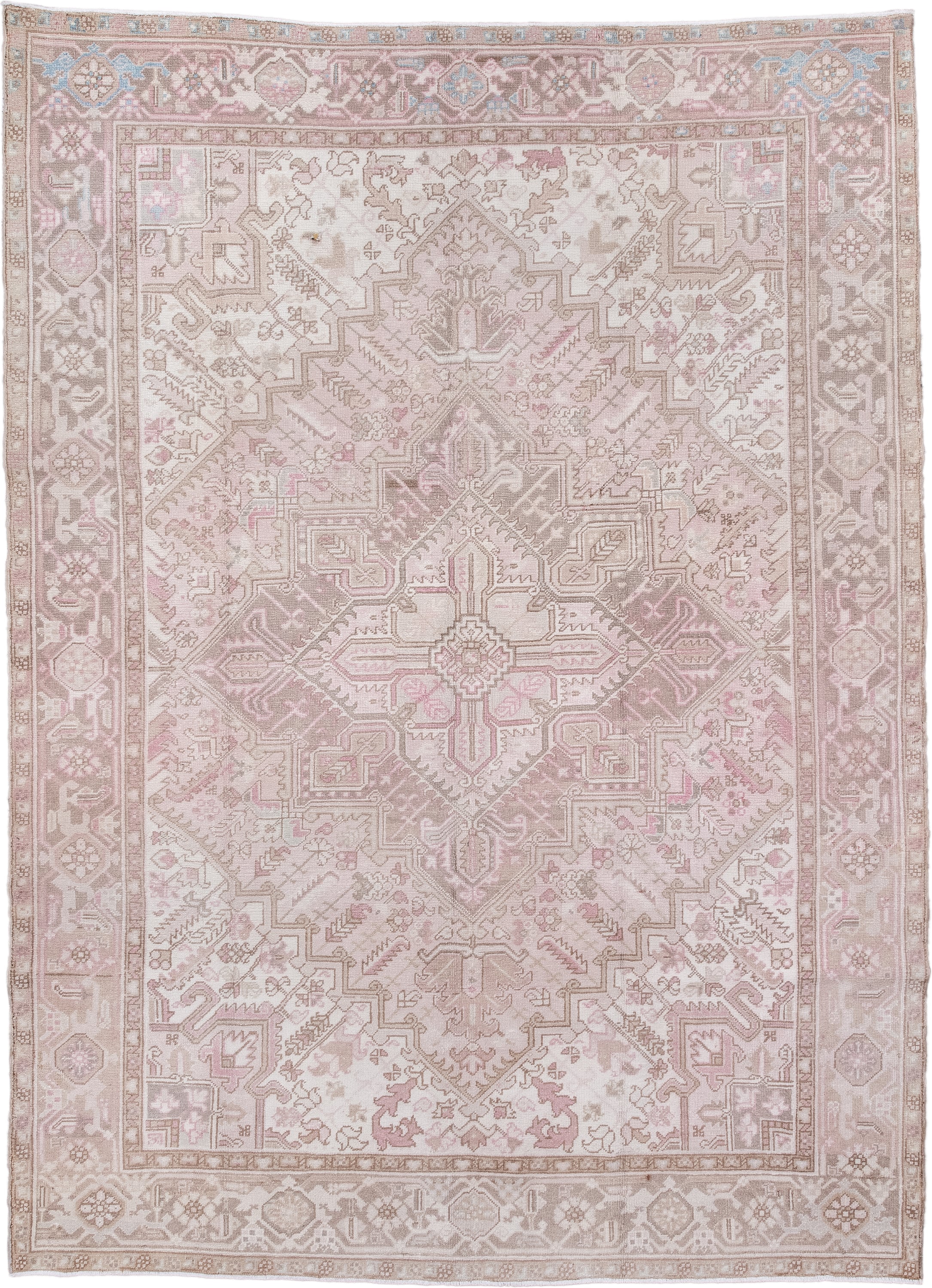 6' x 9' one-of-a-kind handmade antique Heriz medium size rug. Color palette: ivory, blush, taupe, pale blue, dusty rose