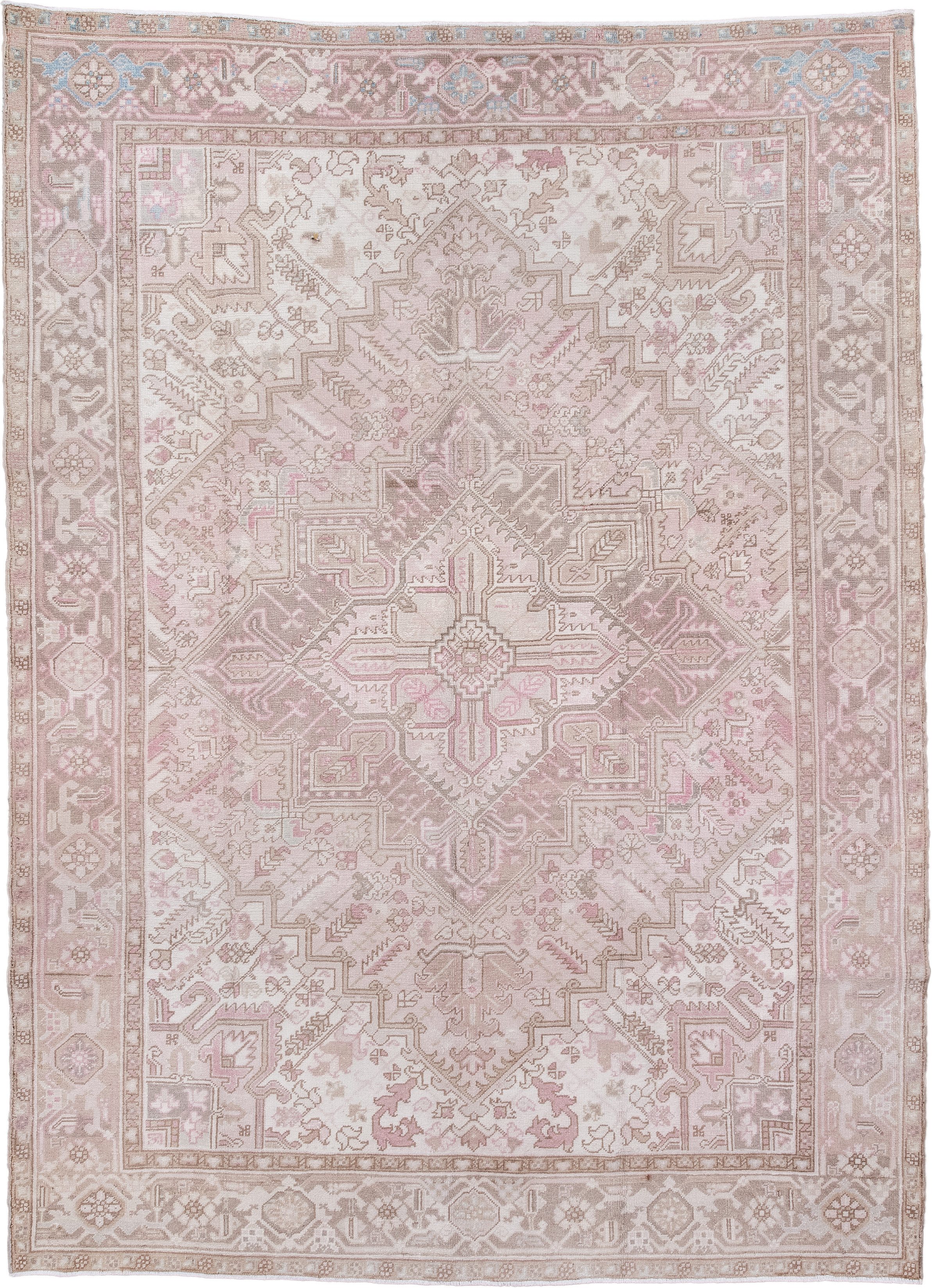 6' x 9' one-of-a-kind handmade antique Heriz medium size rug. Color palette: ivory, blush, taupe, pale blue, dusty rose
