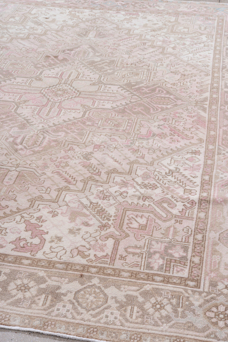 6' x 9' one-of-a-kind handmade antique Heriz medium size rug. Color palette: ivory, blush, taupe, pale blue, dusty rose