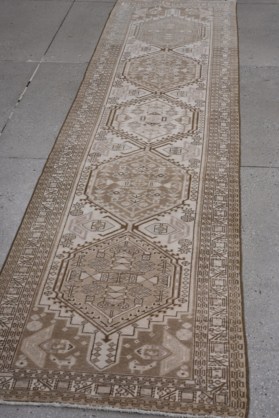 2' x 10' one-of-a-kind handmade antique Sarab runner rug. Color palette: taupe, ivory, brown, camel, rose, charcoal, beige