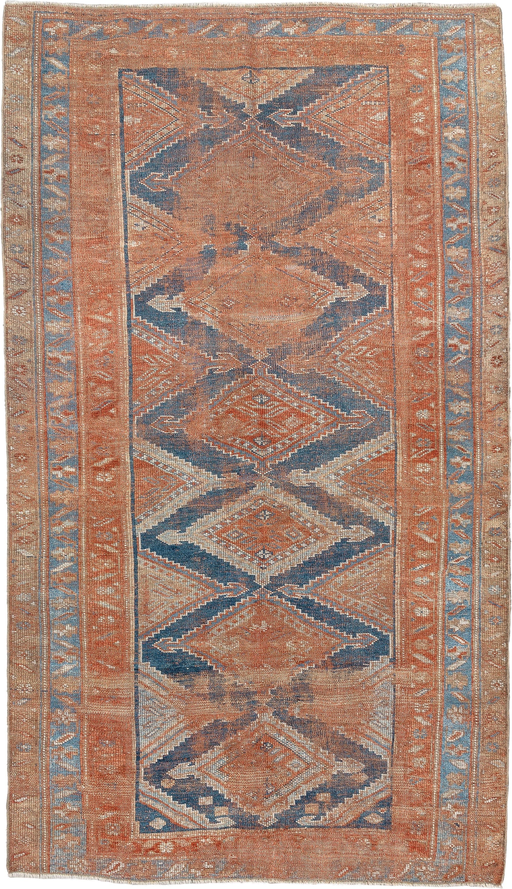 4' x 7' one-of-a-kind handmade antique Kurd rug. Color palette: terracotta, powder blue, ivory, camel, taupe, rust, brown