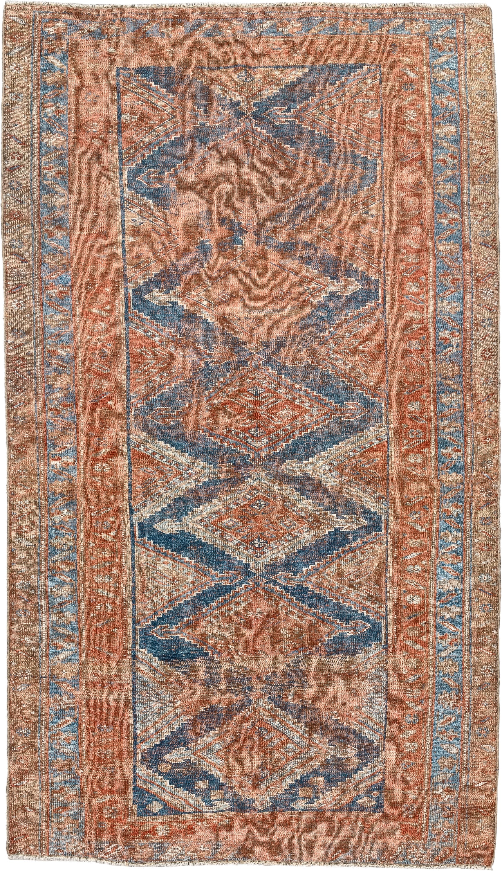 4' x 7' one-of-a-kind handmade antique Kurd rug. Color palette: terracotta, powder blue, ivory, camel, taupe, rust, brown