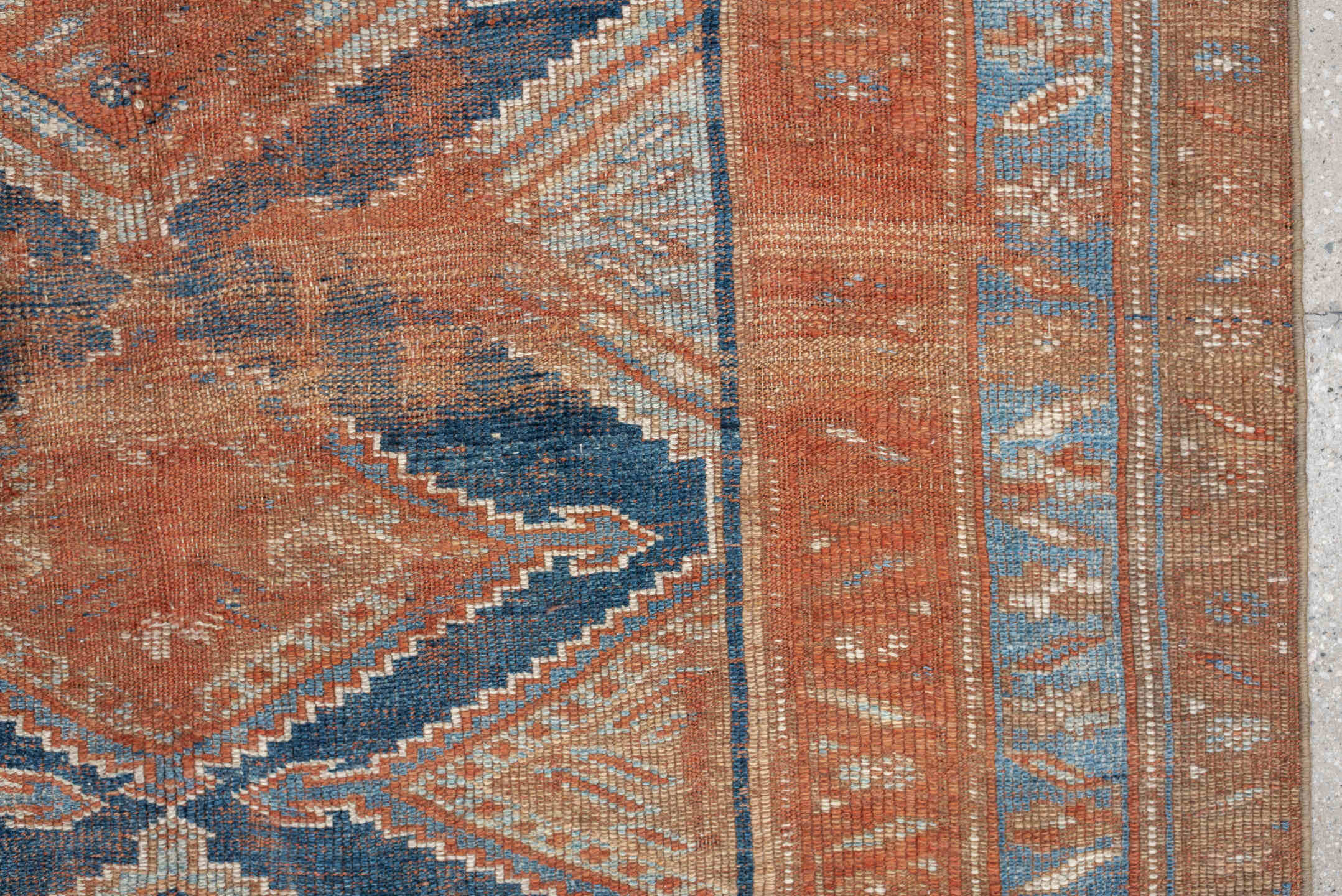 4' x 7' one-of-a-kind handmade antique Kurd rug. Color palette: terracotta, powder blue, ivory, camel, taupe, rust, brown