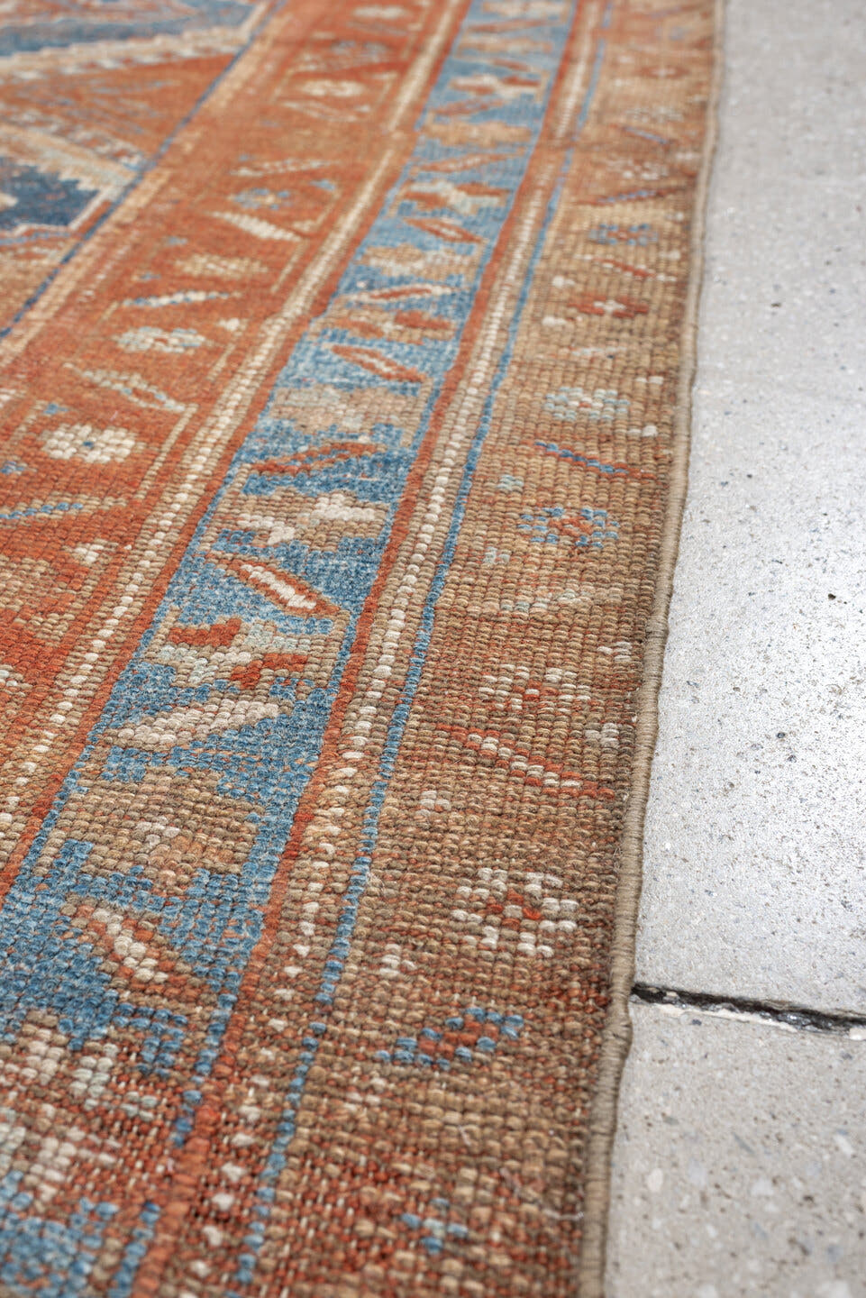 4' x 7' one-of-a-kind handmade antique Kurd rug. Color palette: terracotta, powder blue, ivory, camel, taupe, rust, brown