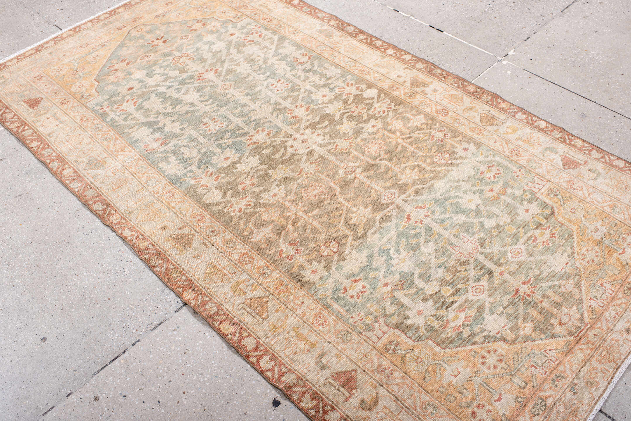 3' x 7' one-of-a-kind handmade antique Malayer rug. Color palette: ivory, sage, sand, terra cotta, taupe, camel, rose, green