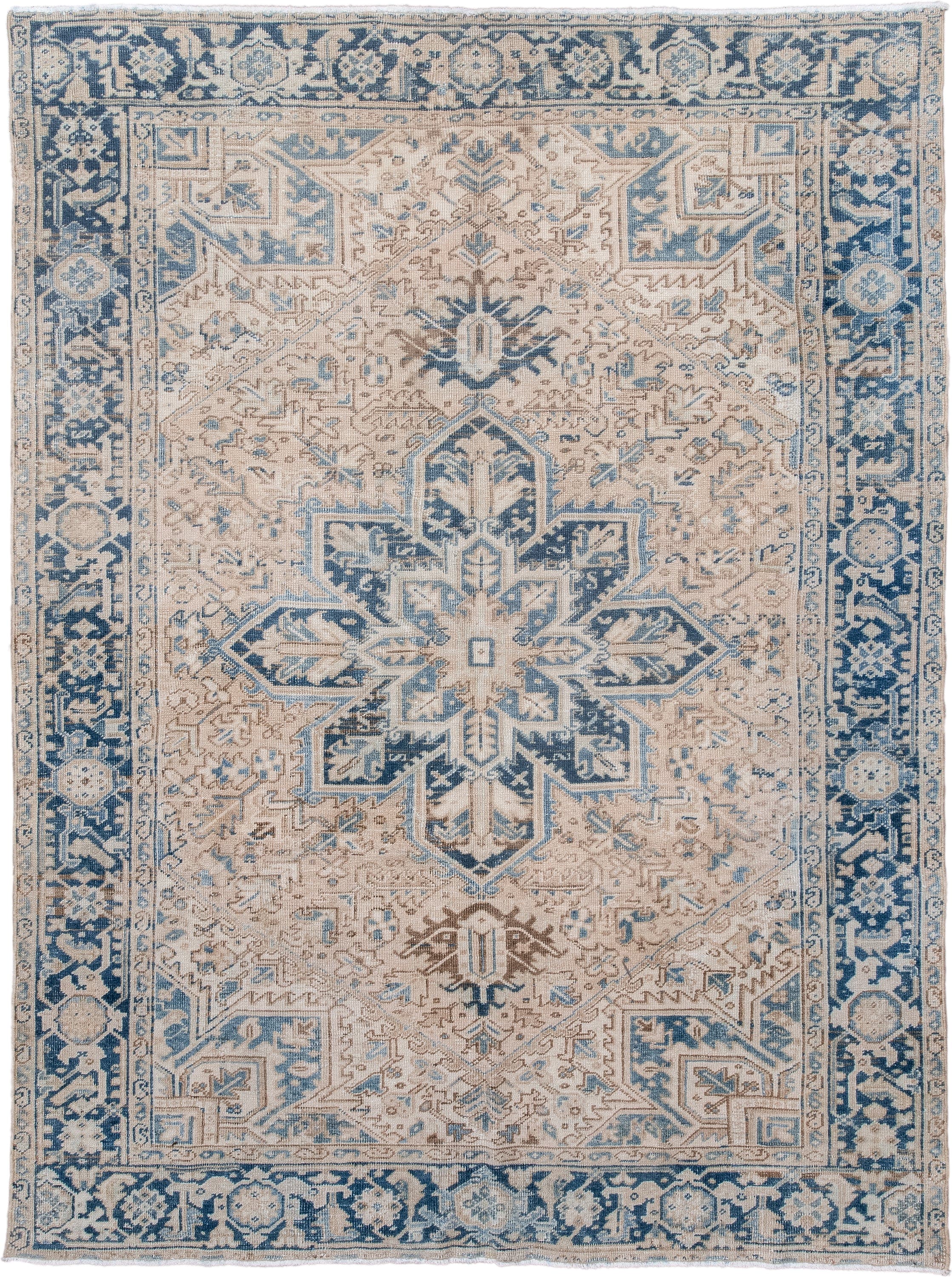 6' x 8' one-of-a-kind handmade antique Heriz medium size rug. Color palette: ivory, blue, navy, beige, taupe, camel, gray