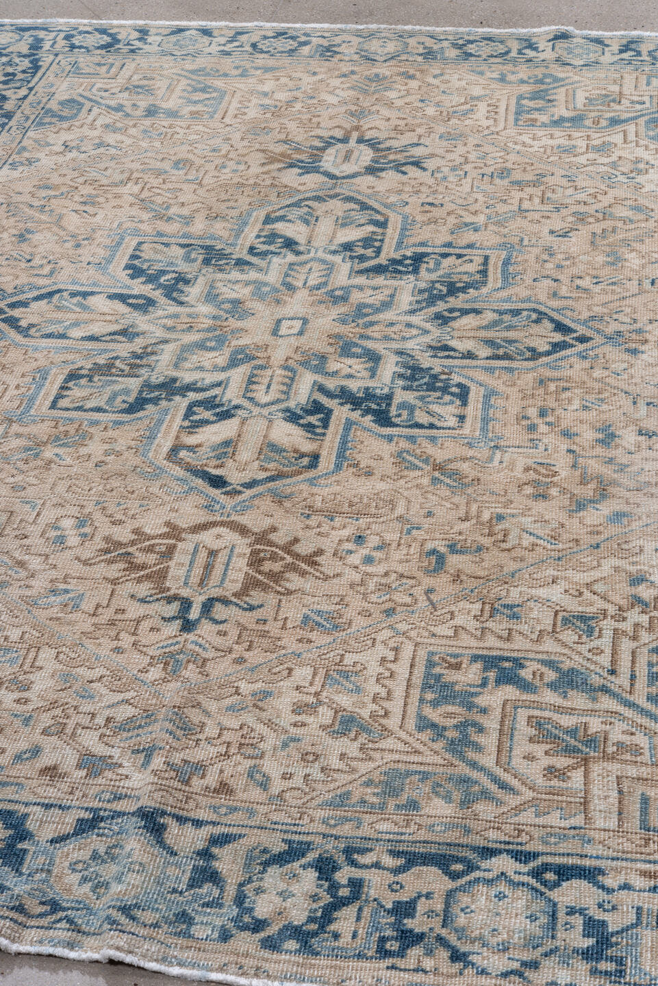 6' x 8' one-of-a-kind handmade antique Heriz medium size rug. Color palette: ivory, blue, navy, beige, taupe, camel, gray