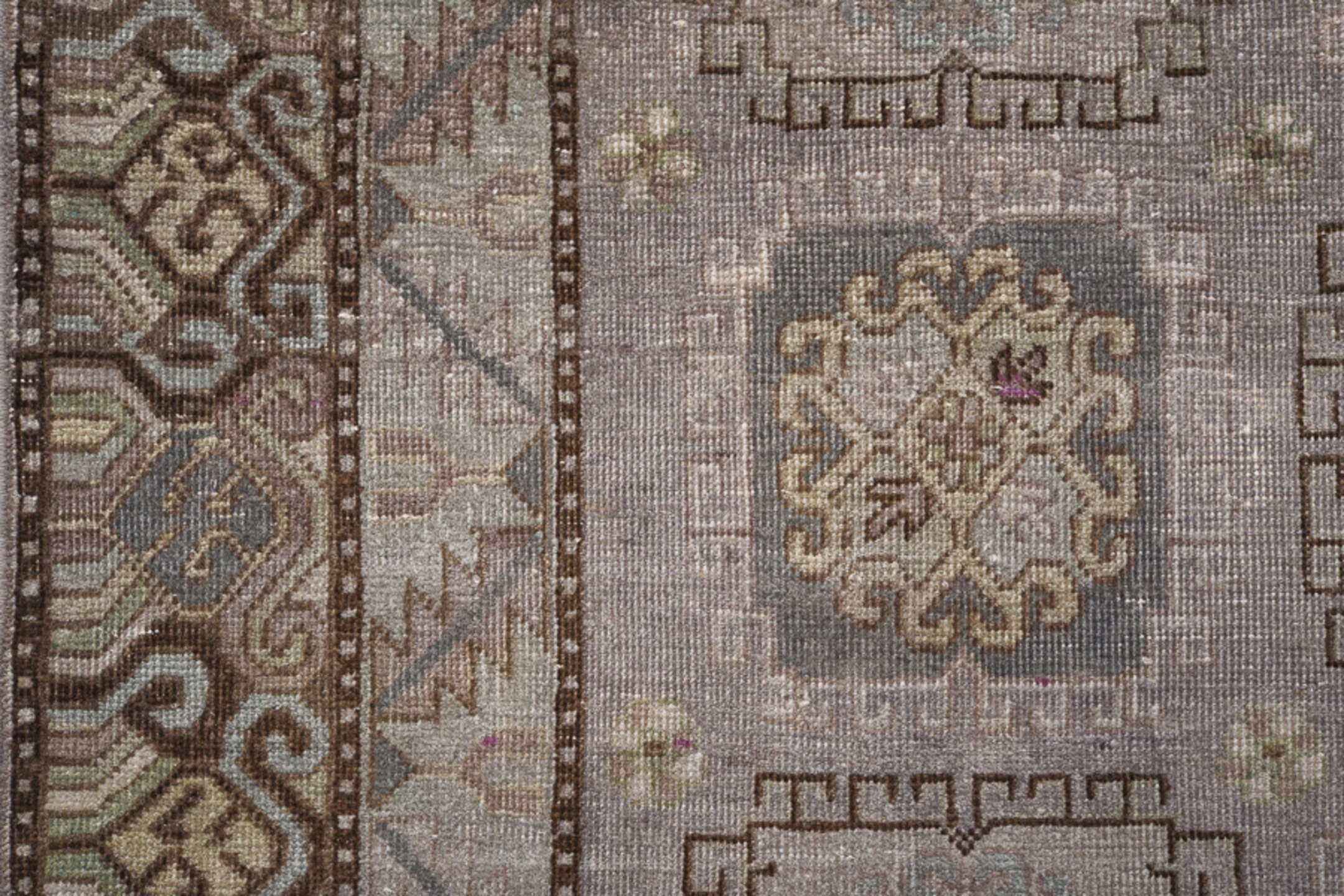 4' x 8' one-of-a-kind handmade antique Khotan rug. Color palette: taupe, ivory, brown, dusty rose, sage, slate, beige, gray
