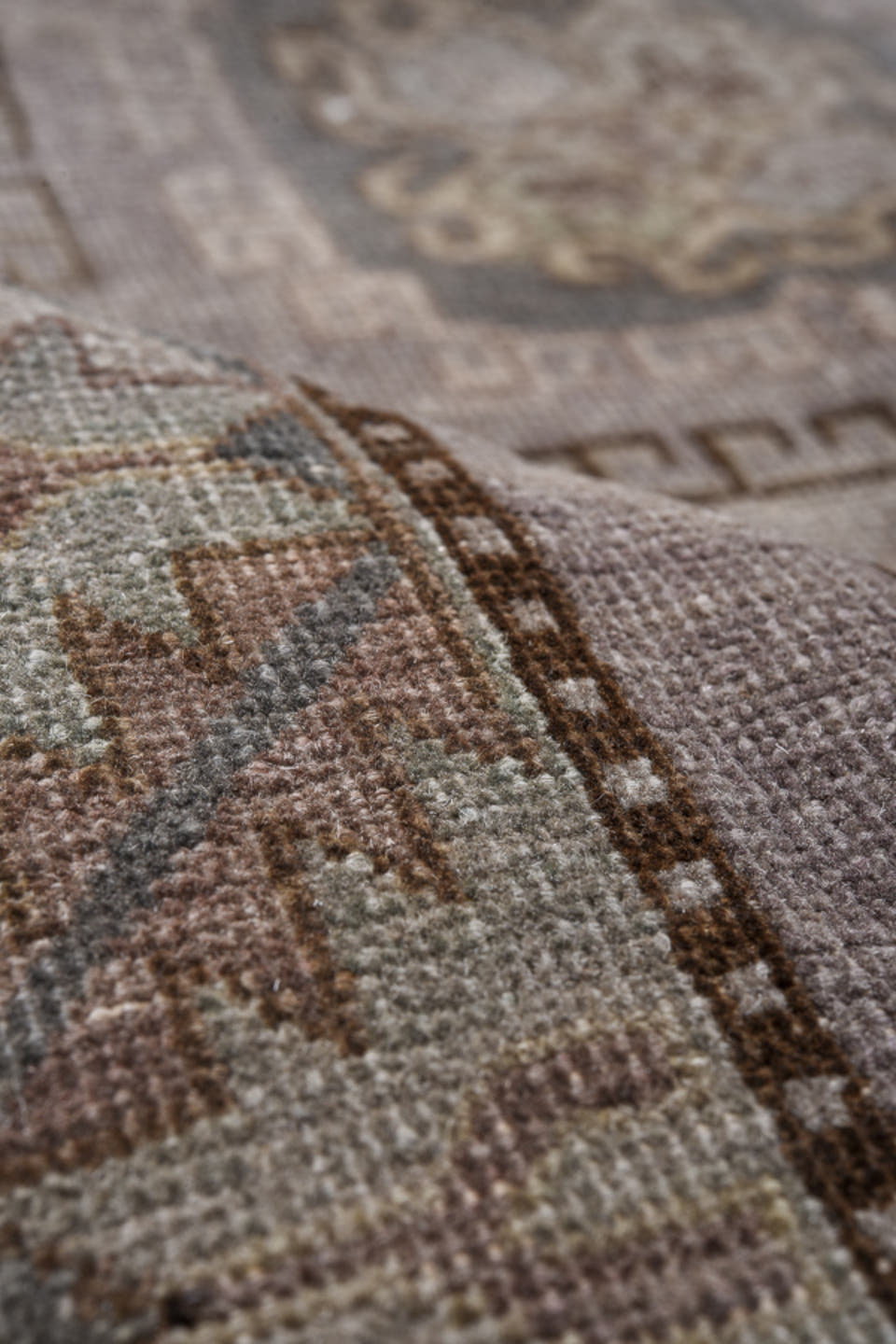 4' x 8' one-of-a-kind handmade antique Khotan rug. Color palette: taupe, ivory, brown, dusty rose, sage, slate, beige, gray