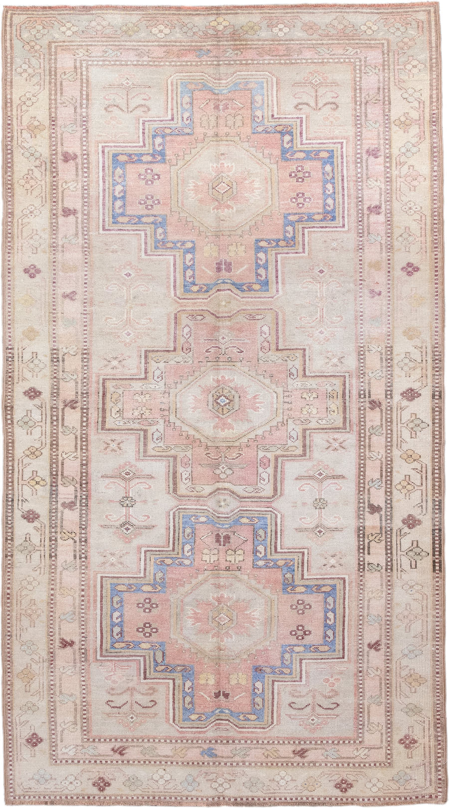 4' x 8' one-of-a-kind handmade antique Caucasian rug. Color palette: ivory, blush, rose, sky blue, taupe, dusty pink, sage