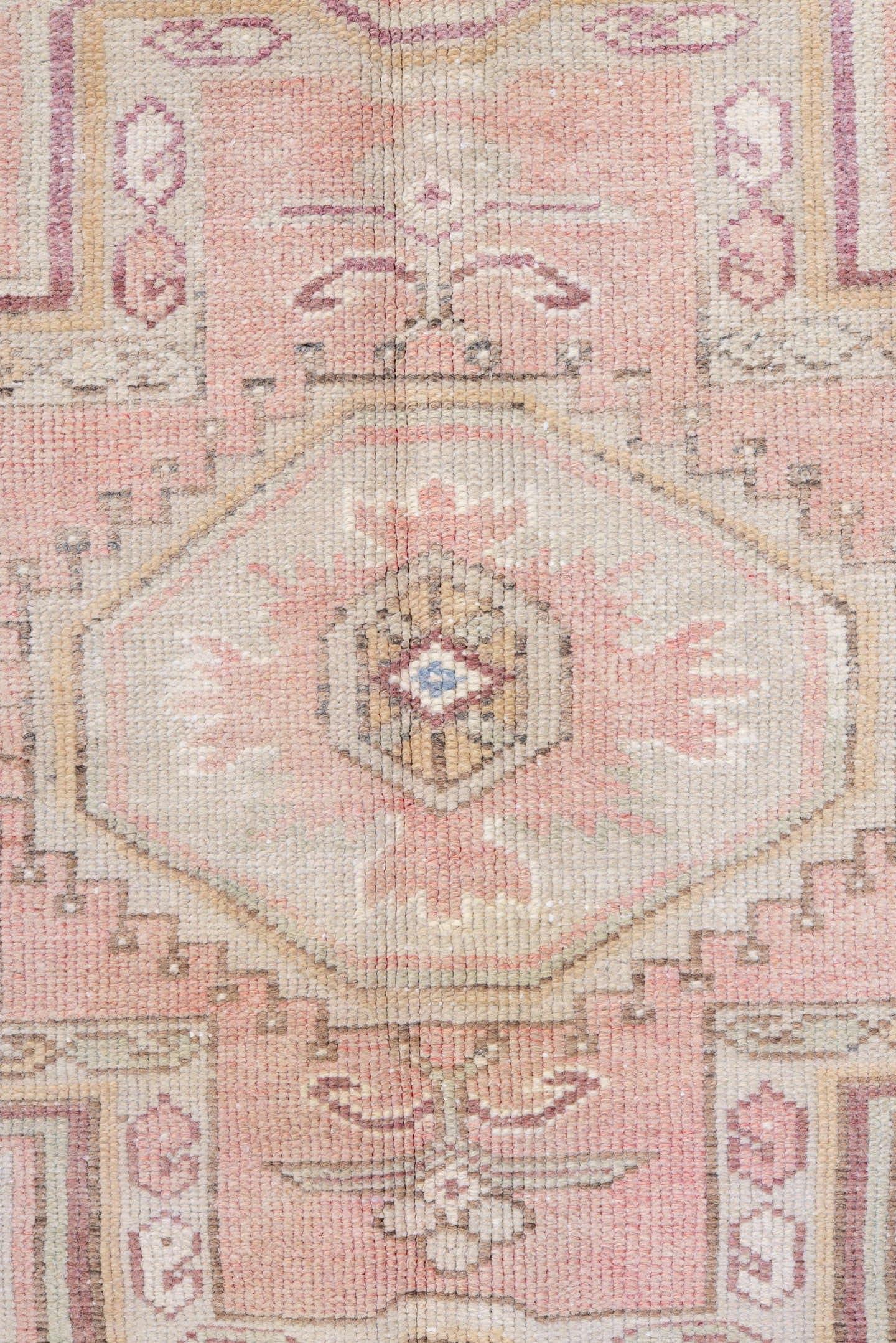 4' x 8' one-of-a-kind handmade antique Caucasian rug. Color palette: ivory, blush, rose, sky blue, taupe, dusty pink, sage