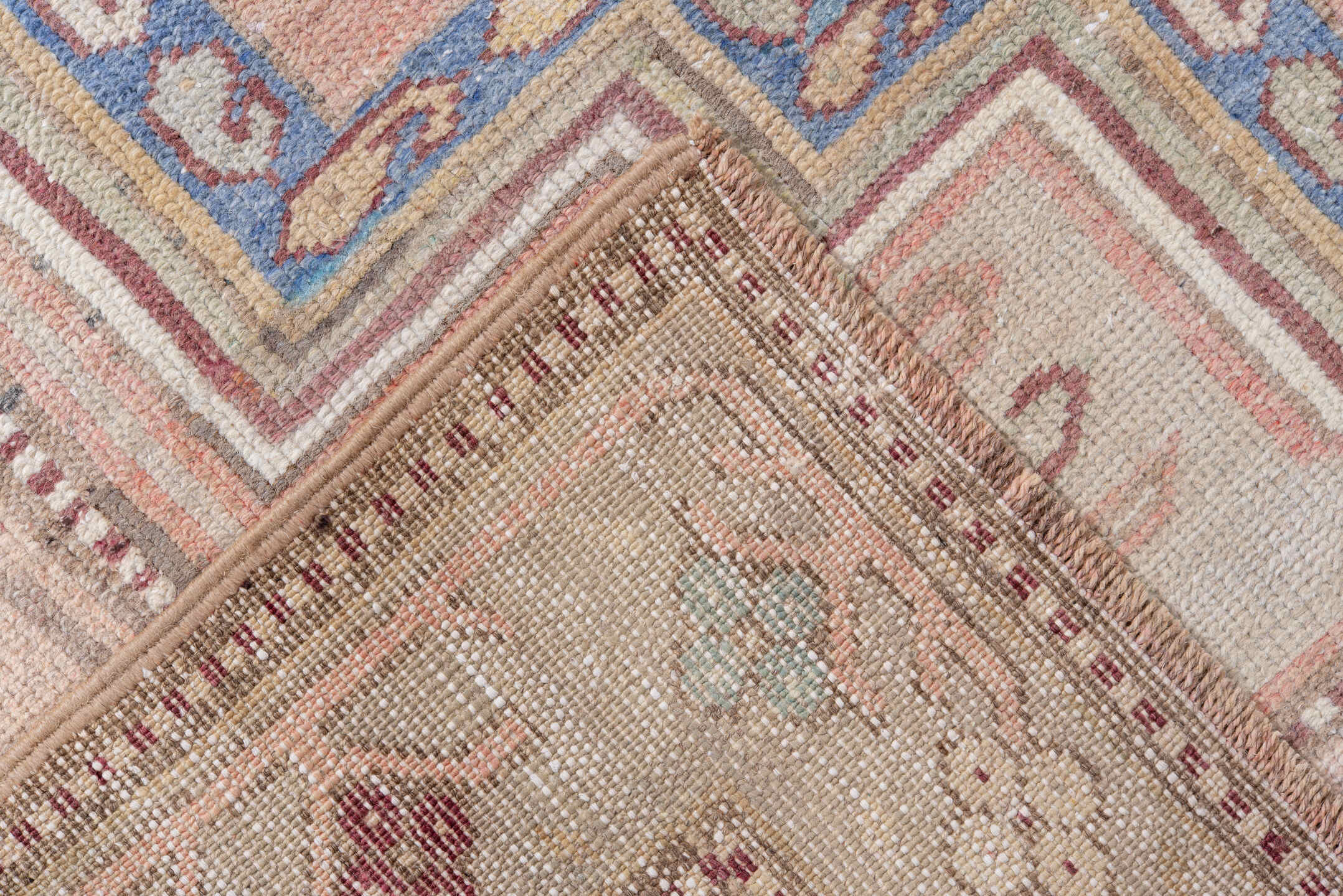 4' x 8' one-of-a-kind handmade antique Caucasian rug. Color palette: ivory, blush, rose, sky blue, taupe, dusty pink, sage