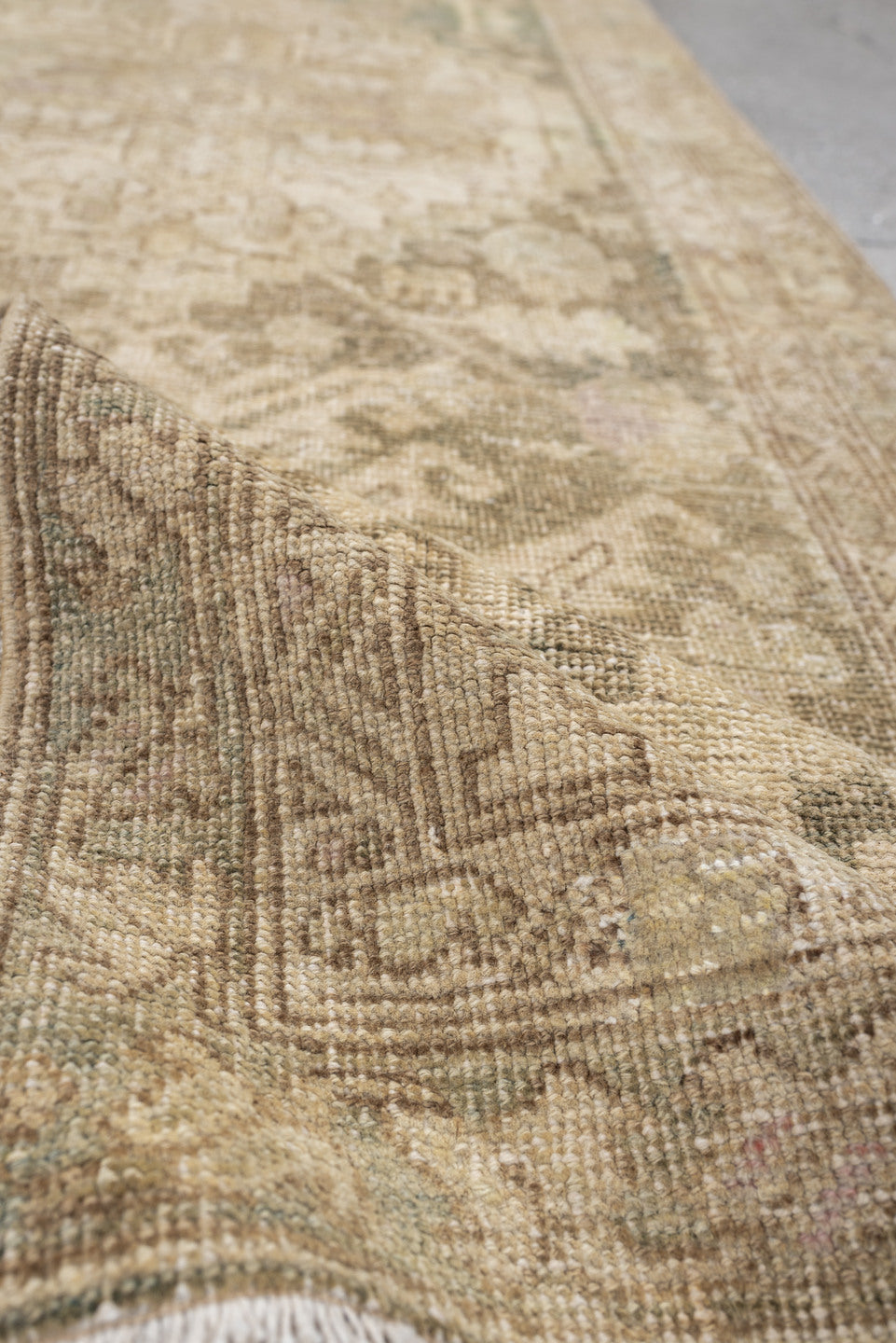 2' x 11' one-of-a-kind handmade antique Sarab runner rug. Color palette: ivory, taupe, beige, sage, pale rust, camel, brown