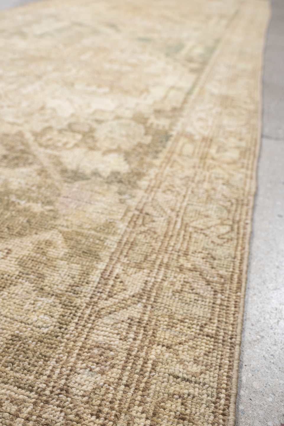 2' x 11' one-of-a-kind handmade antique Sarab runner rug. Color palette: ivory, taupe, beige, sage, pale rust, camel, brown