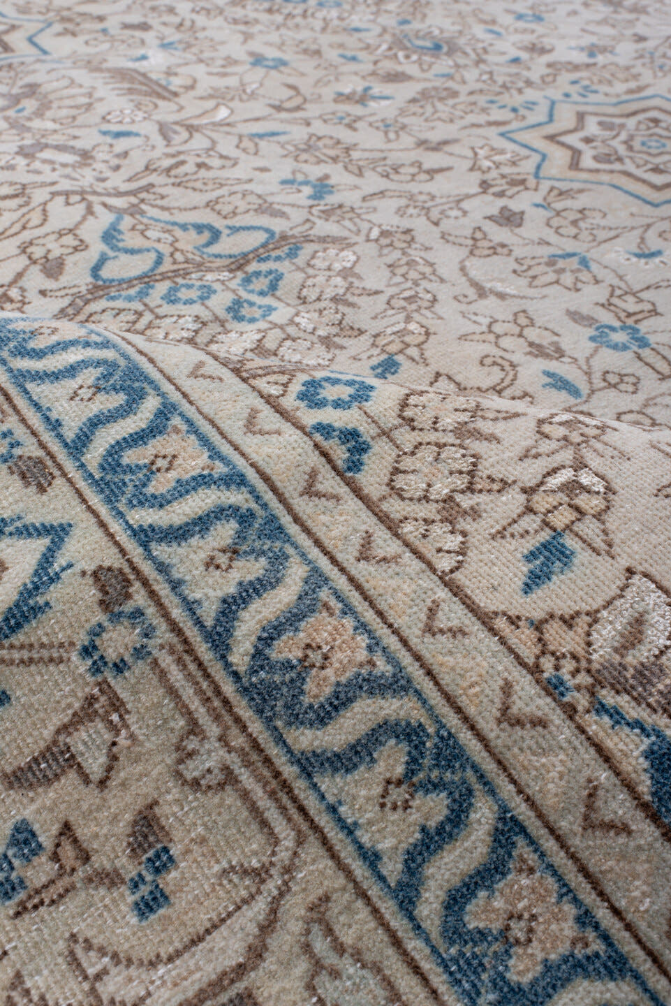 7' x 11' one-of-a-kind handmade antique Tabriz large size rug. Color palette: ivory, sky blue, taupe, beige, camel