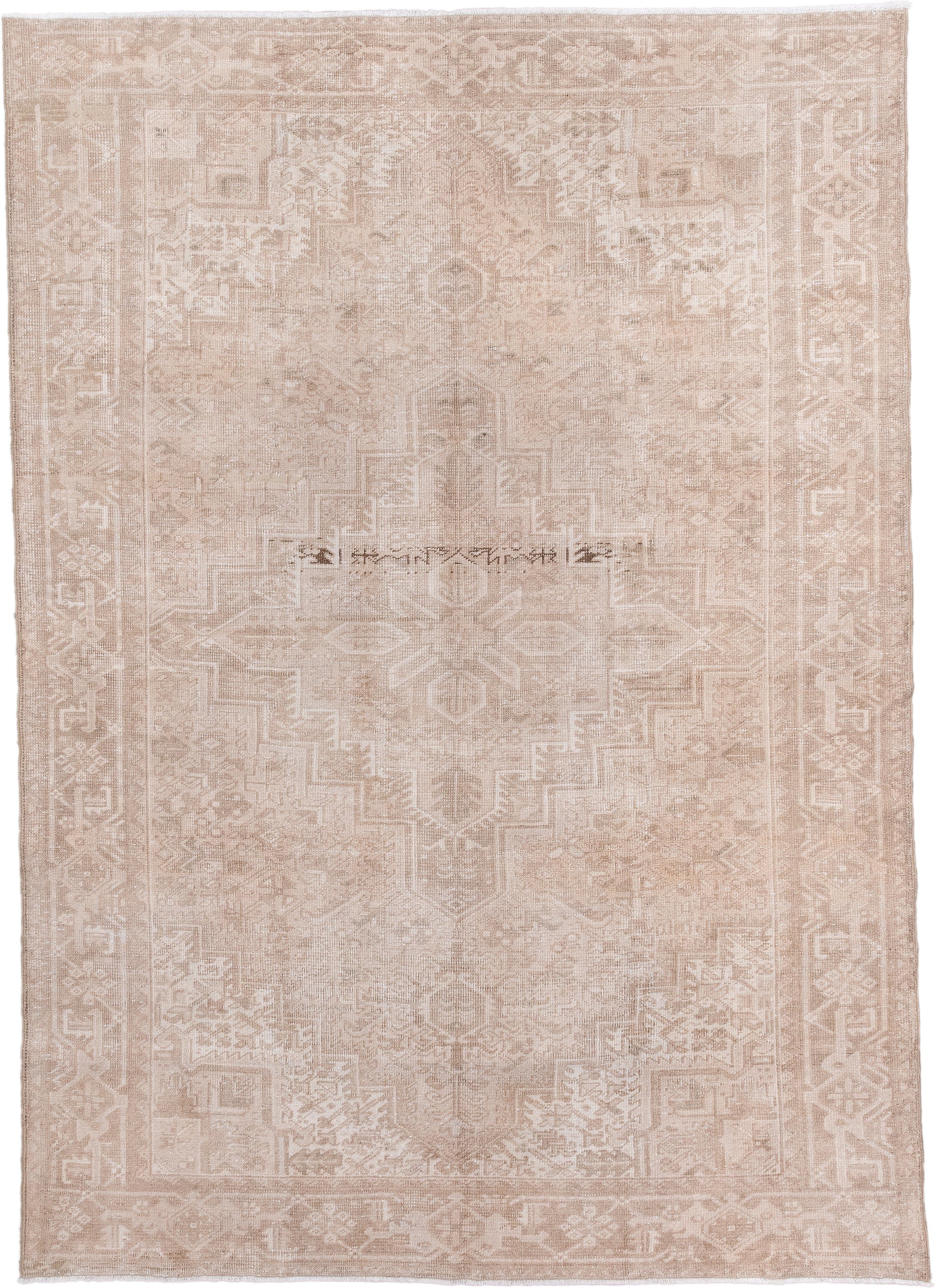6' x 9' one-of-a-kind handmade antique Heriz medium size rug. Color palette: beige, ivory, taupe, sand, camel, gray