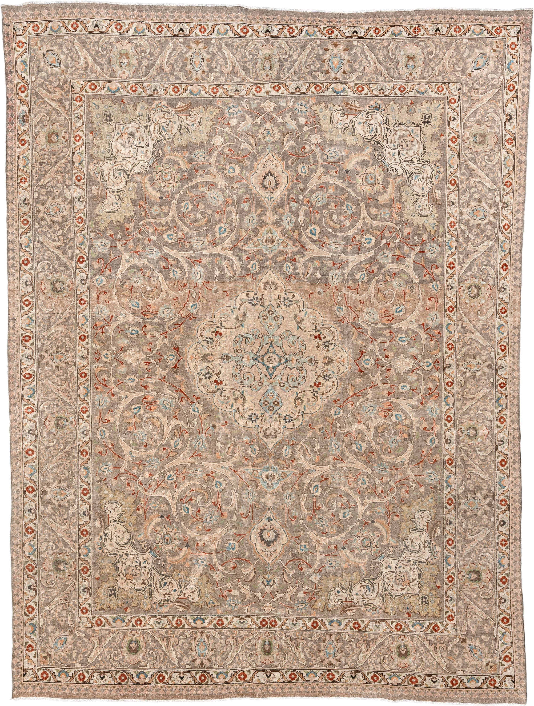 9' x 12' one-of-a-kind handmade vintage Tabriz large size rug. Color palette: taupe, ivory, camel, pale blue, rust, cream